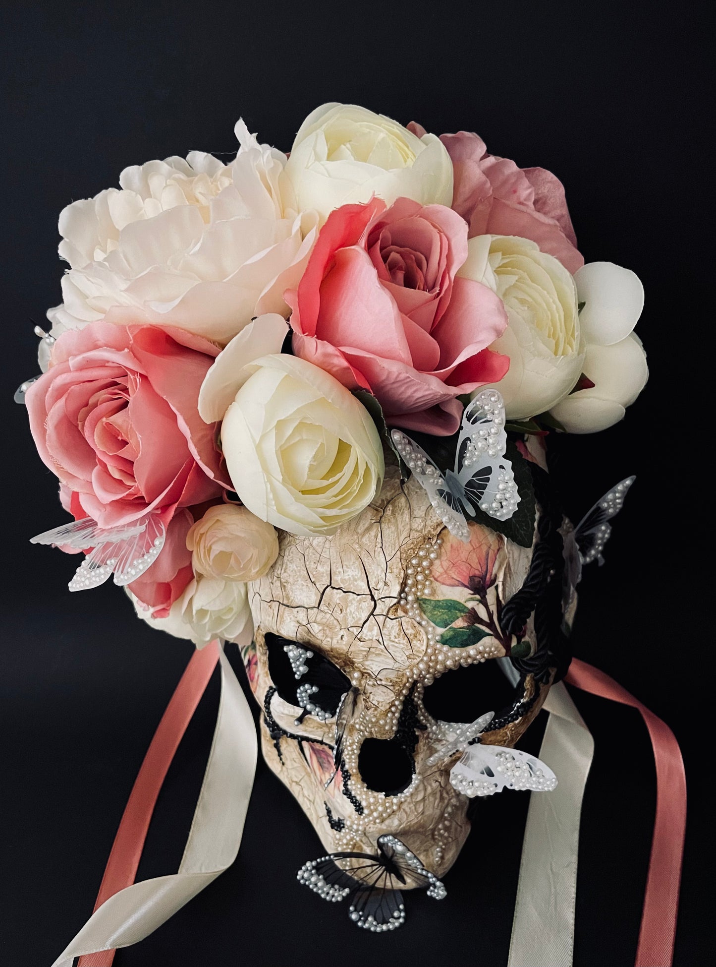 White Santa Muerte mask. Skull mask with butterflies