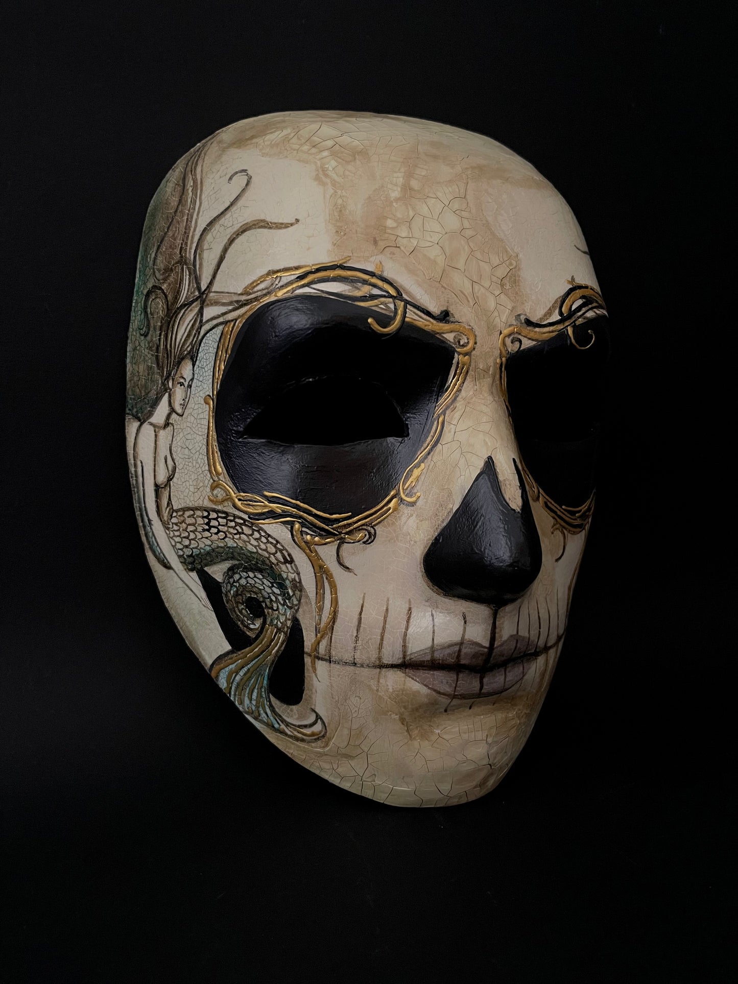 Day of the dead mask with mermaids