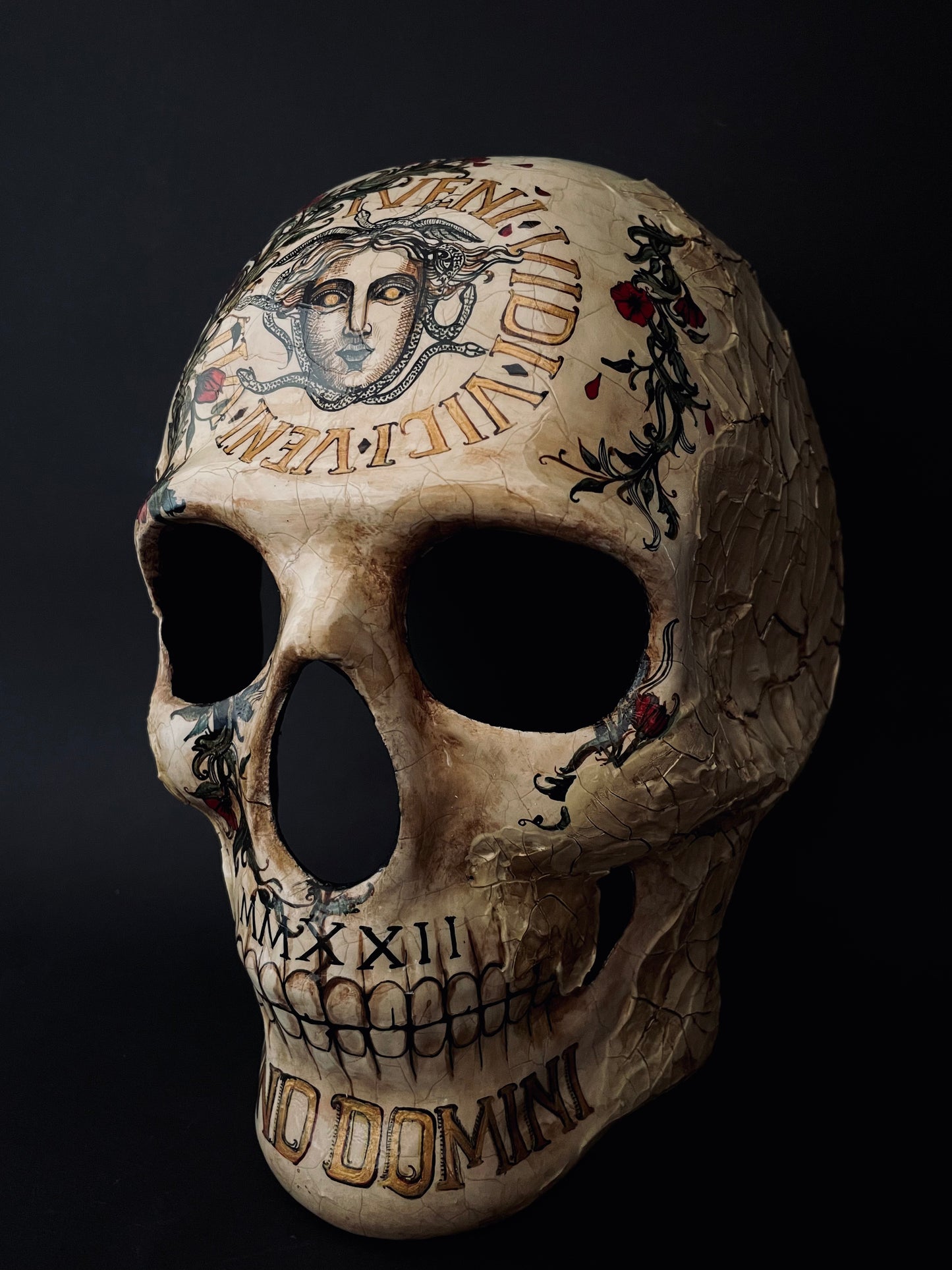 Skull mask with Medusa. Memento mori skull.