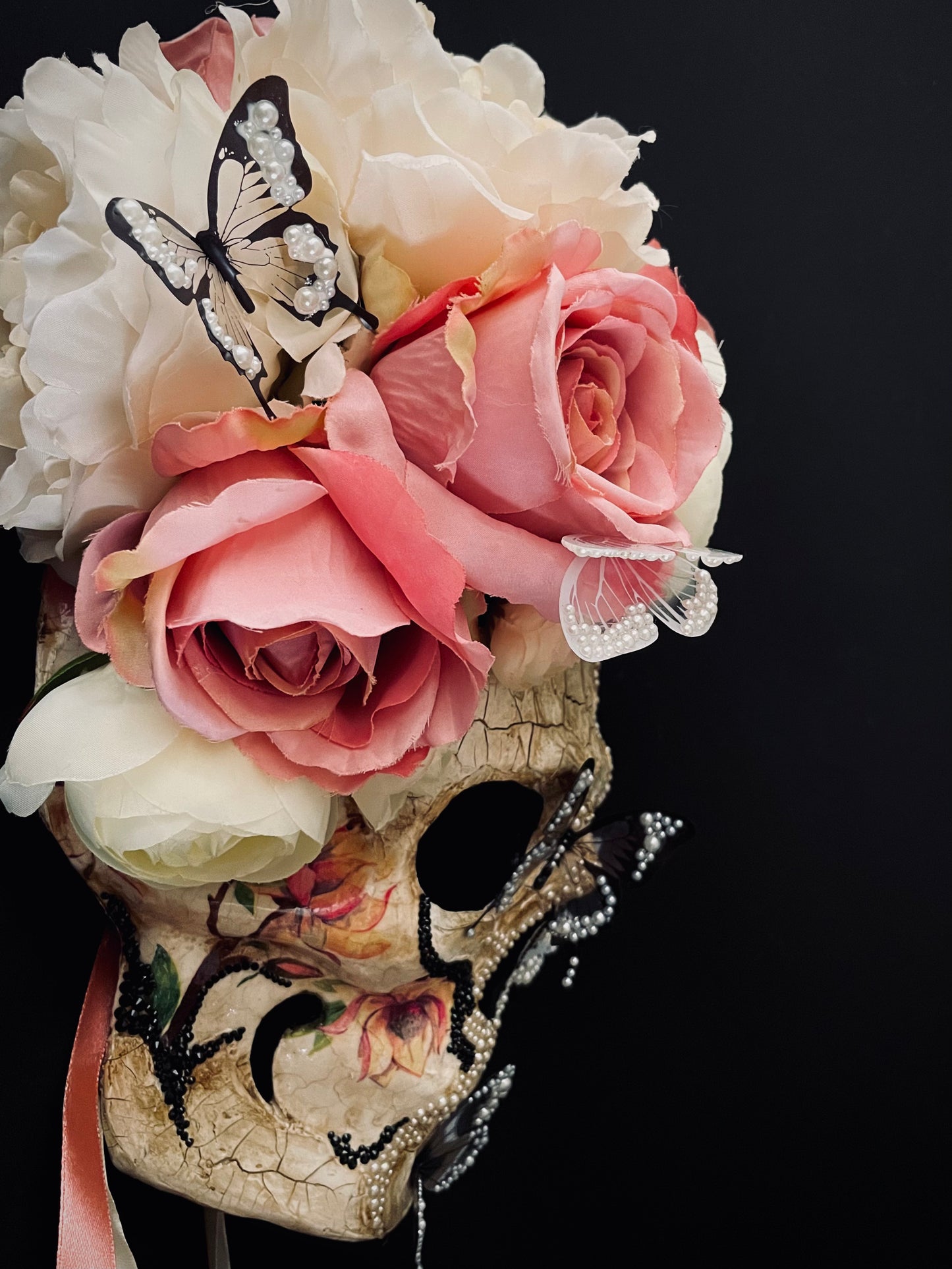 White Santa Muerte mask. Skull mask with butterflies