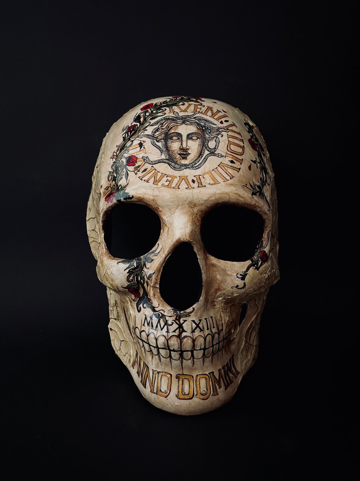 Skull mask with Medusa. Memento mori skull.