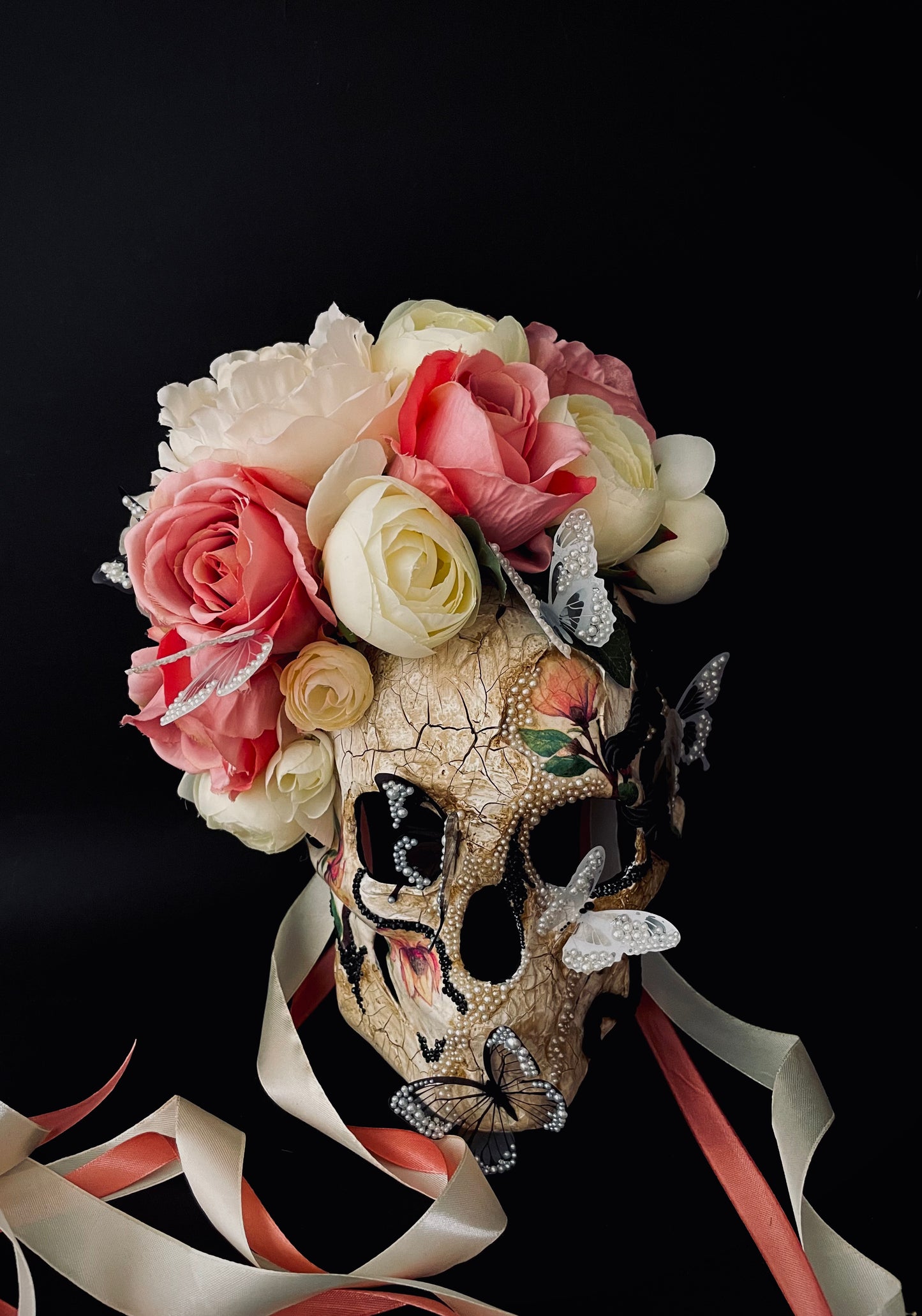 White Santa Muerte mask. Skull mask with butterflies
