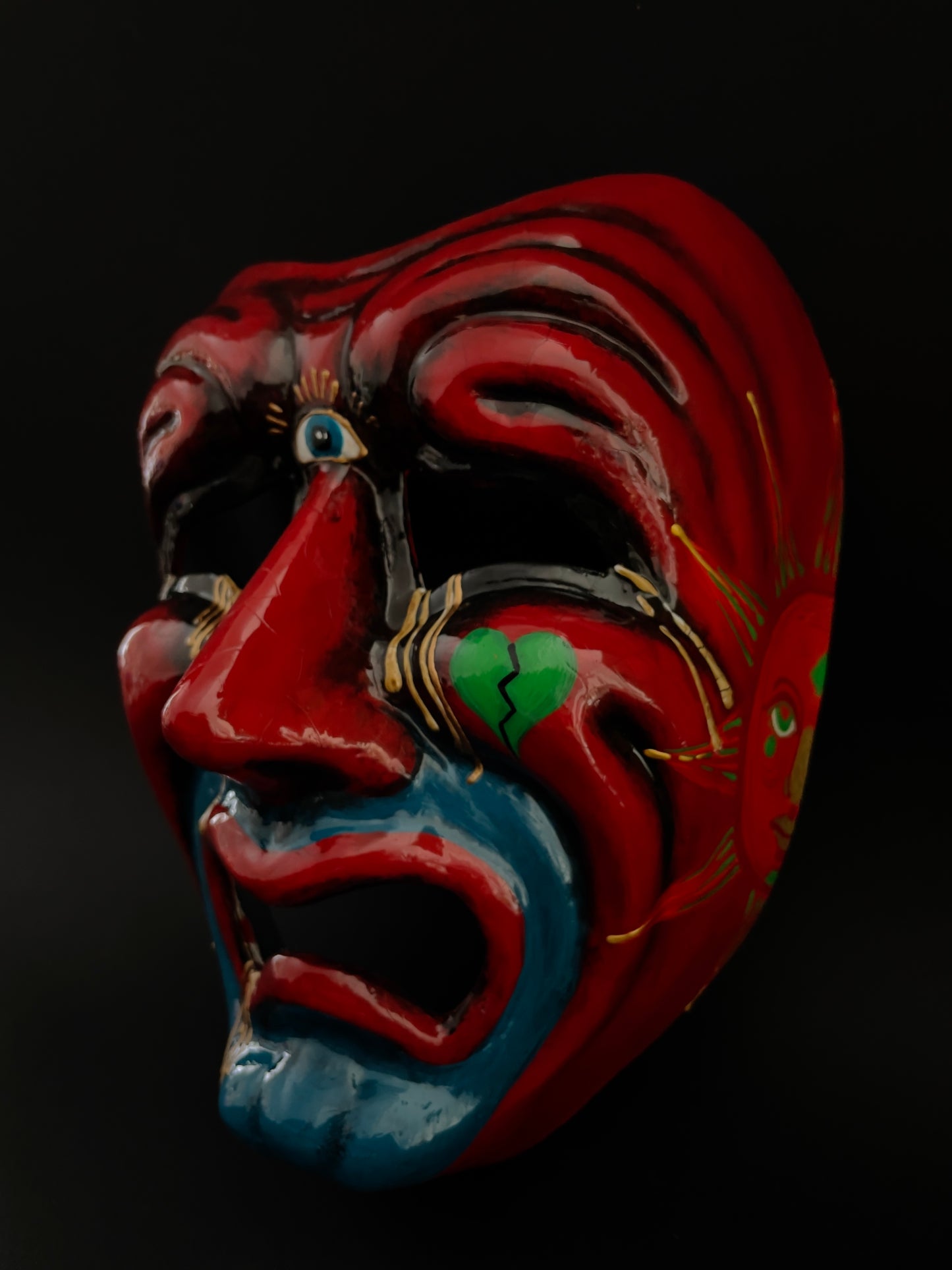 Red tragic clown