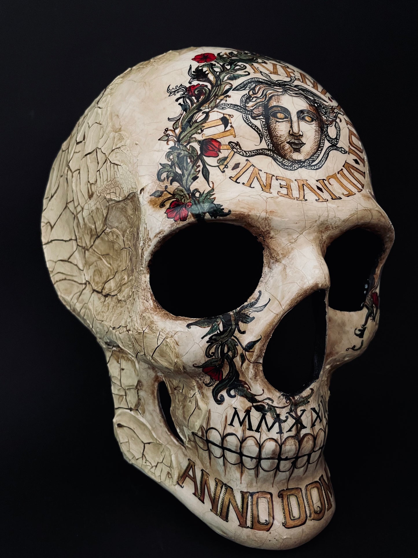 Skull mask with Medusa. Memento mori skull.