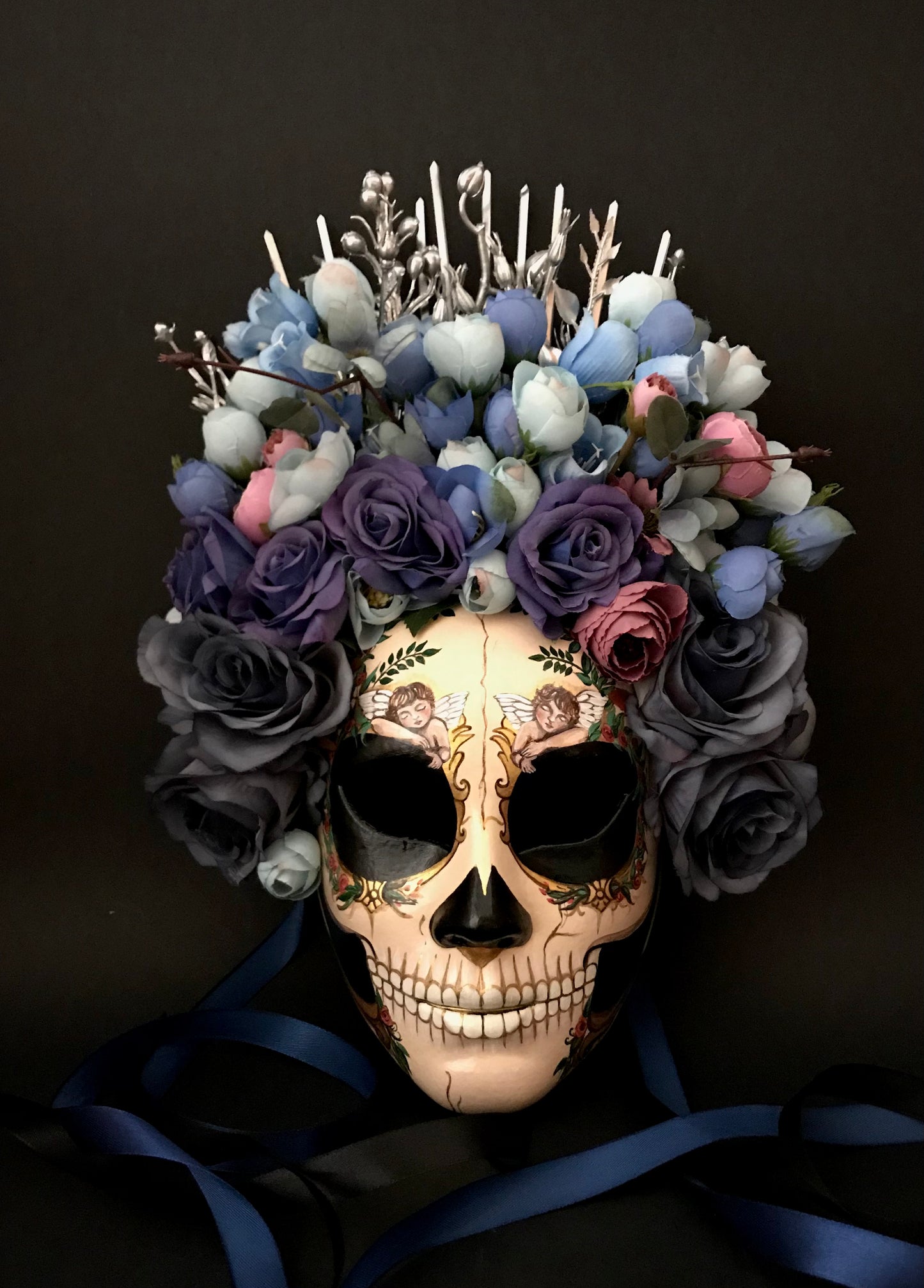 Catrina mask with sleeping angels