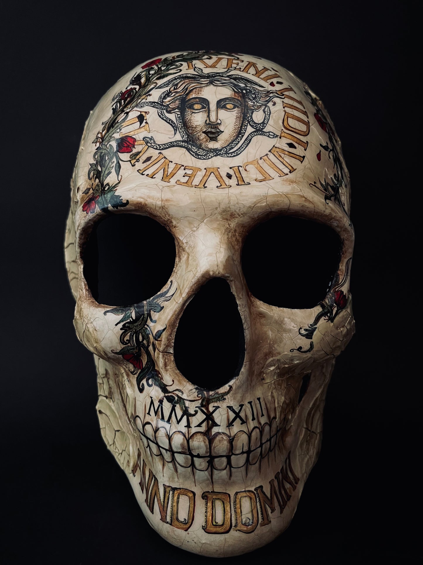 Skull mask with Medusa. Memento mori skull.