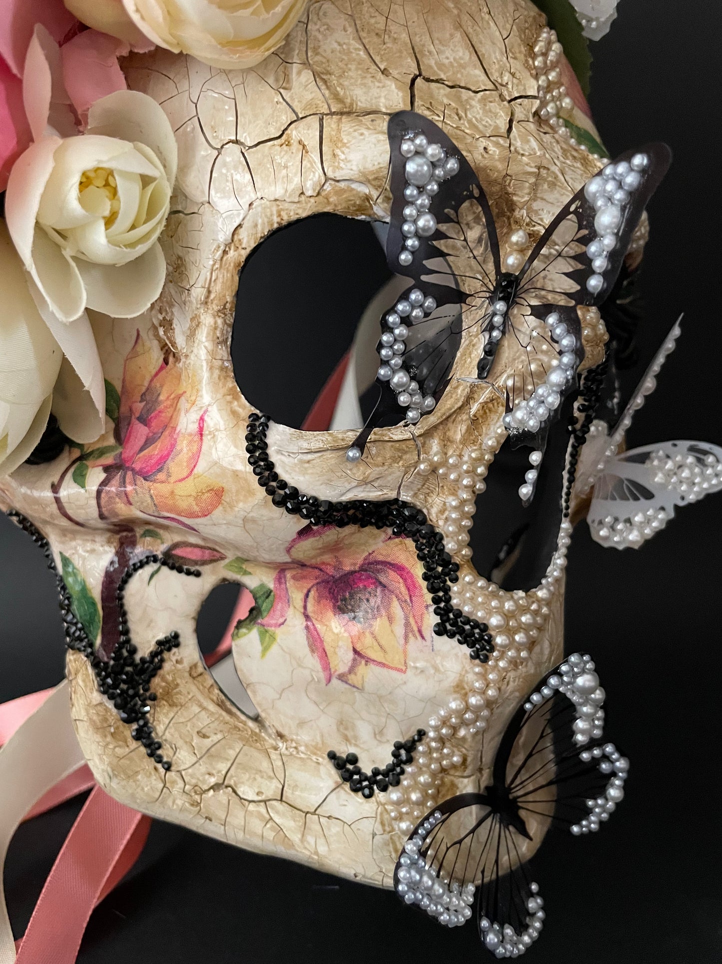 White Santa Muerte mask. Skull mask with butterflies