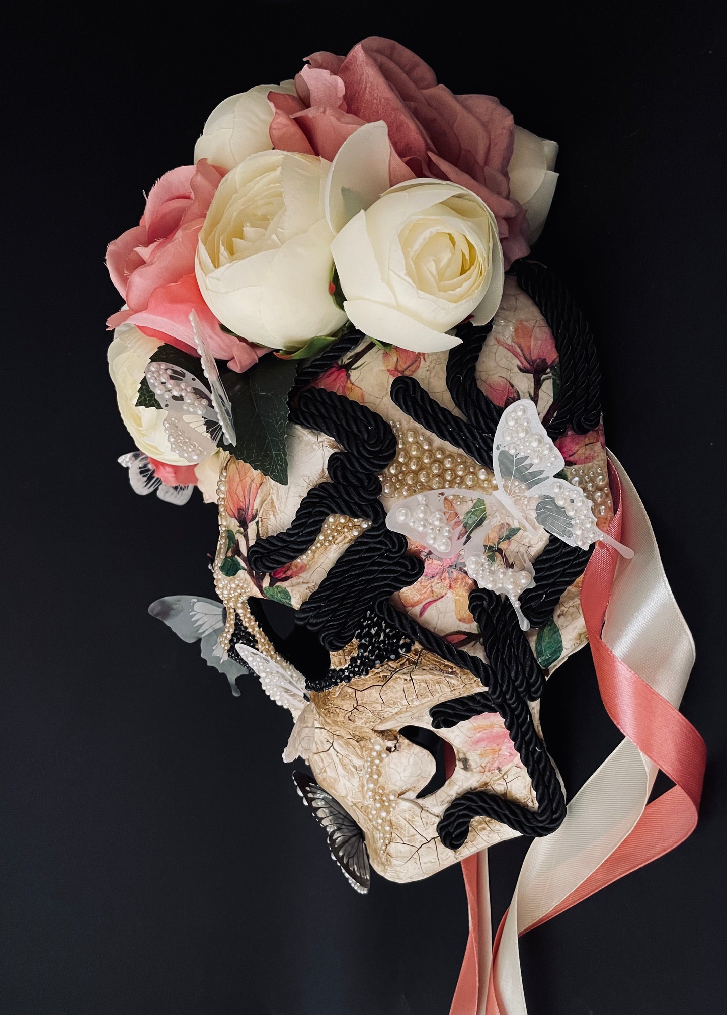 White Santa Muerte mask. Skull mask with butterflies