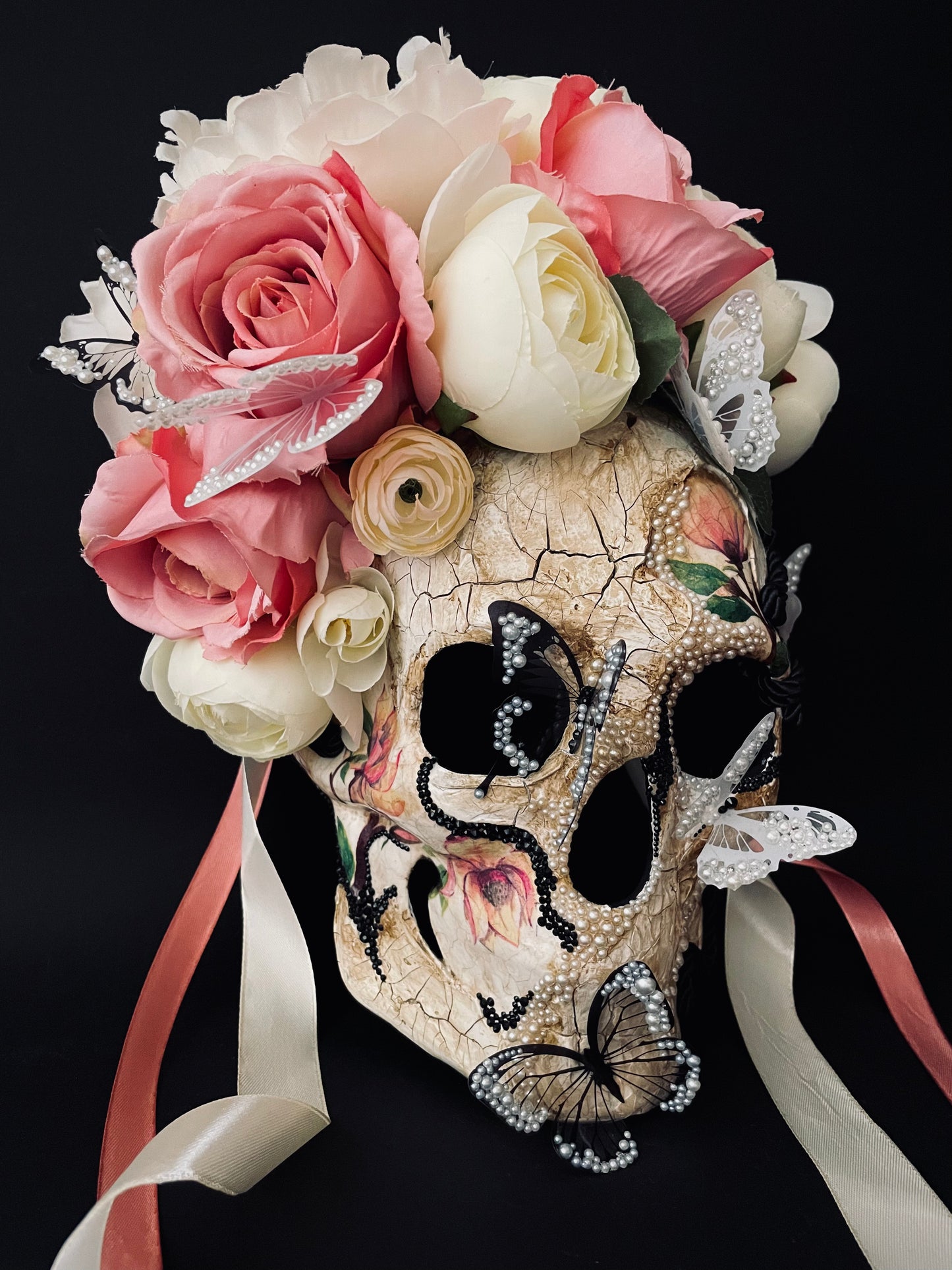 White Santa Muerte mask. Skull mask with butterflies