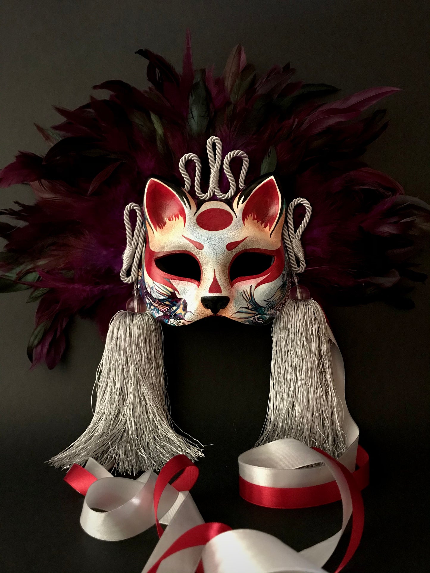 Kitsune mask with feathers