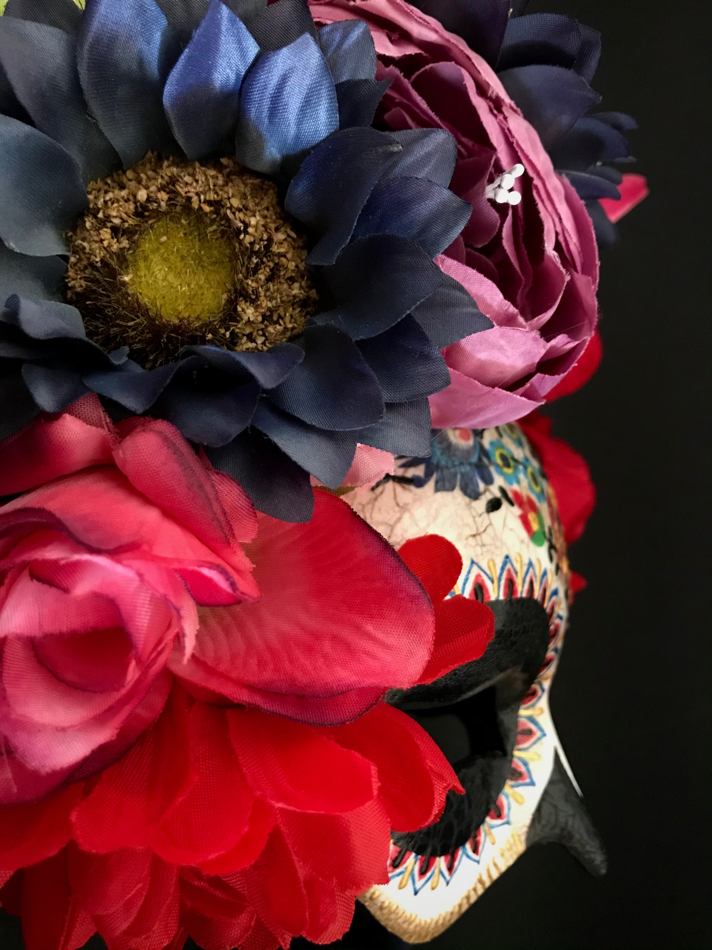 Half face Catrina mask with colored flowers