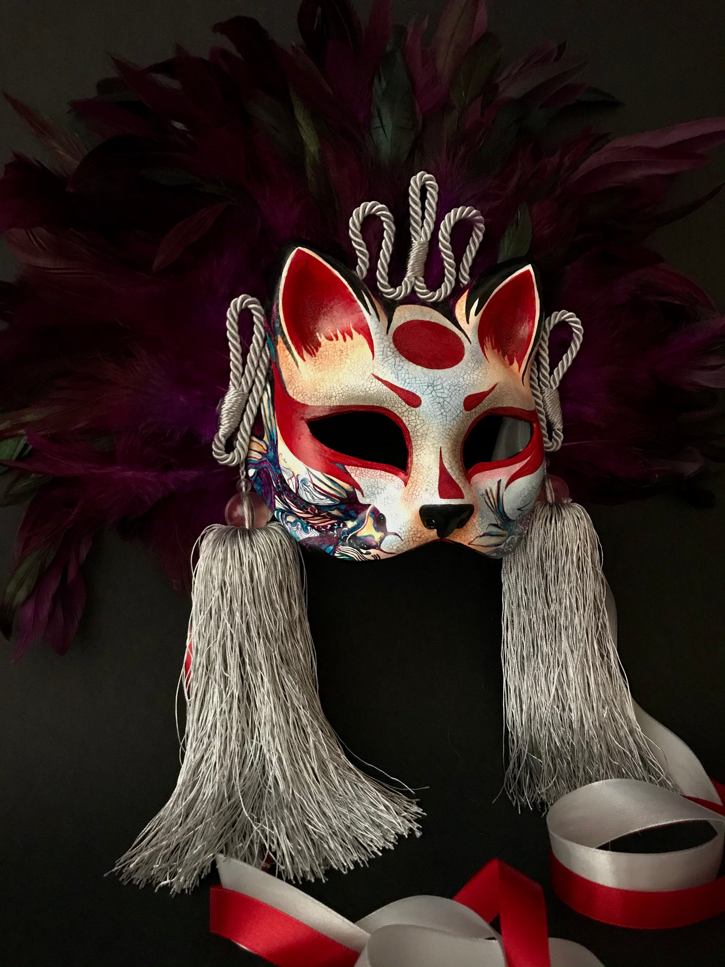 Kitsune mask with feathers