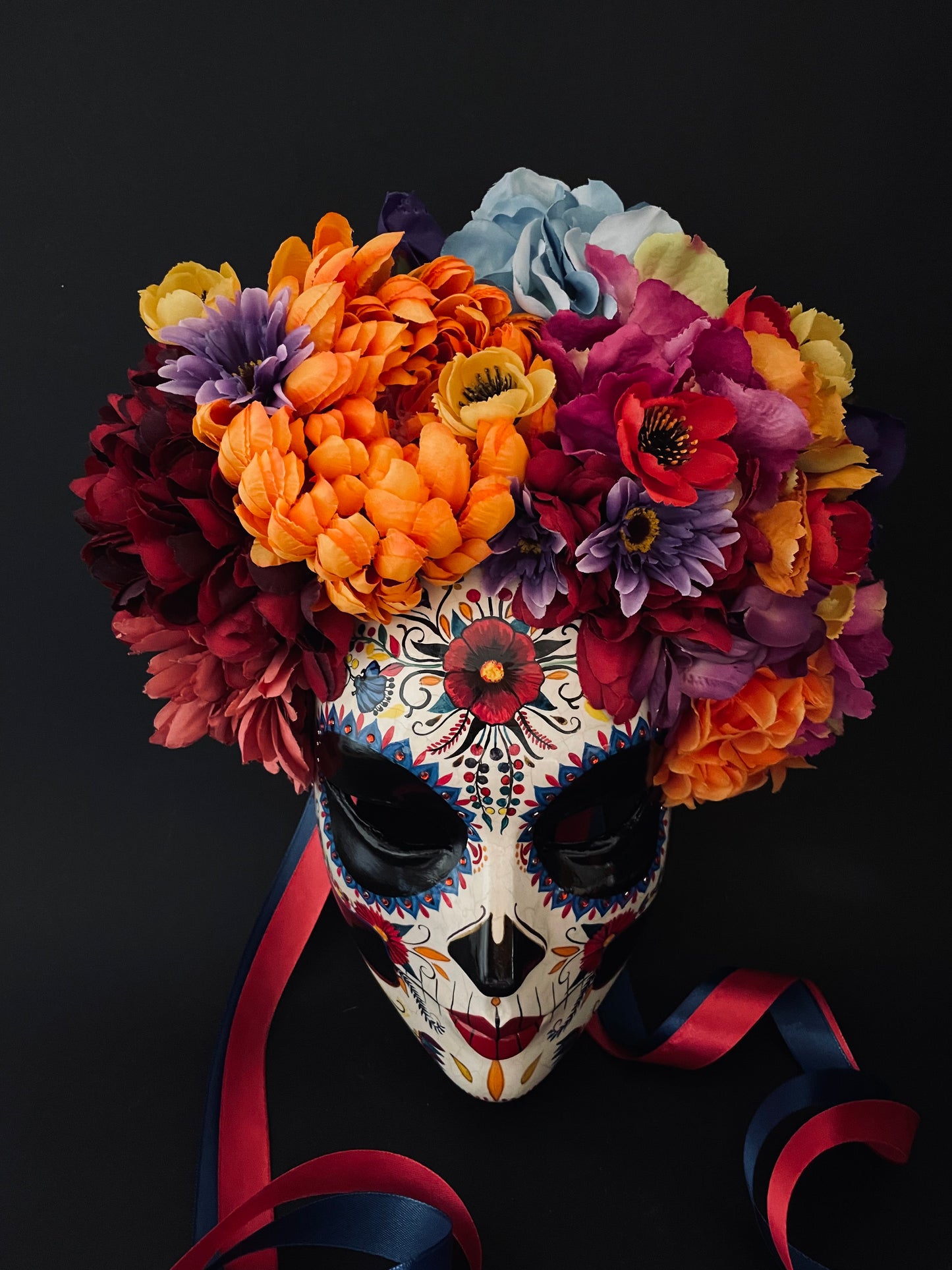 Catrina mask with colored flowers