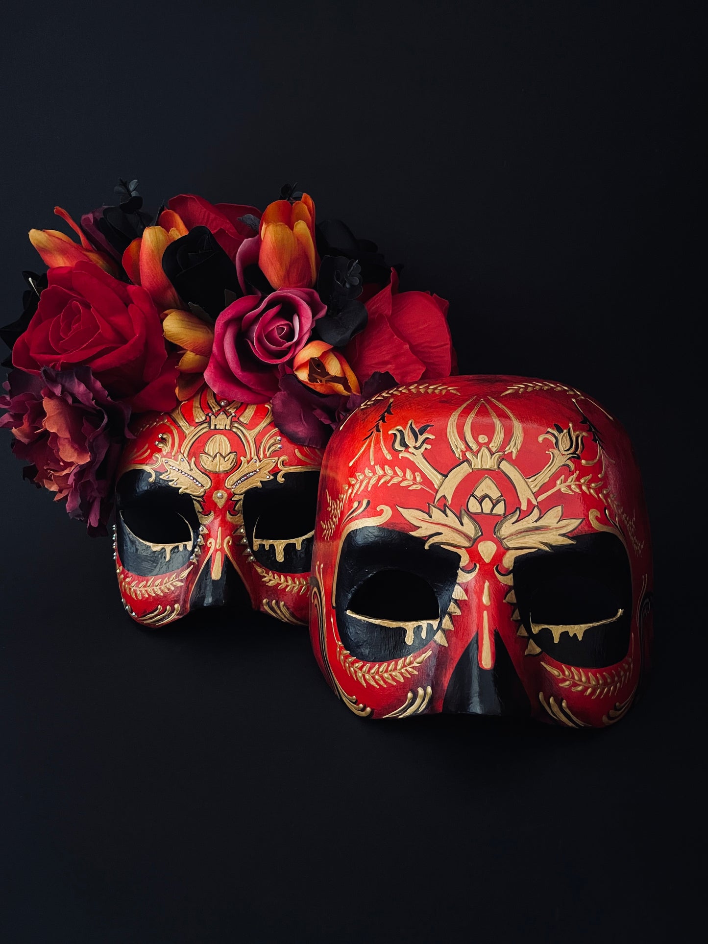 Red couple’s masks. Day of the dead couple