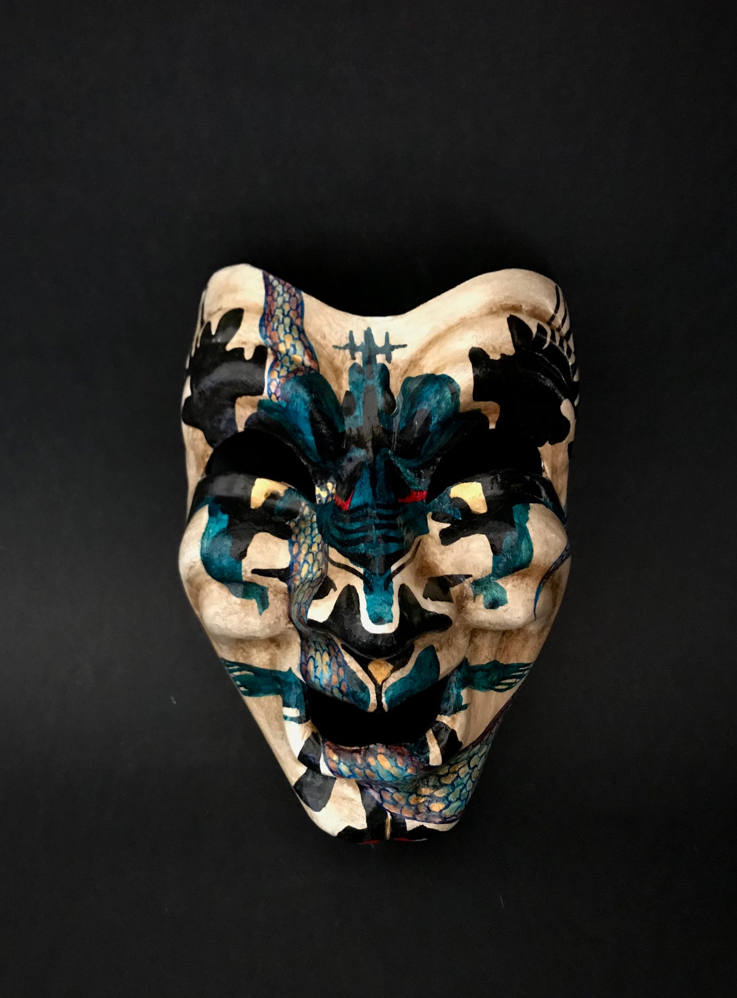 Inkblot clown mask. Clown with snakes