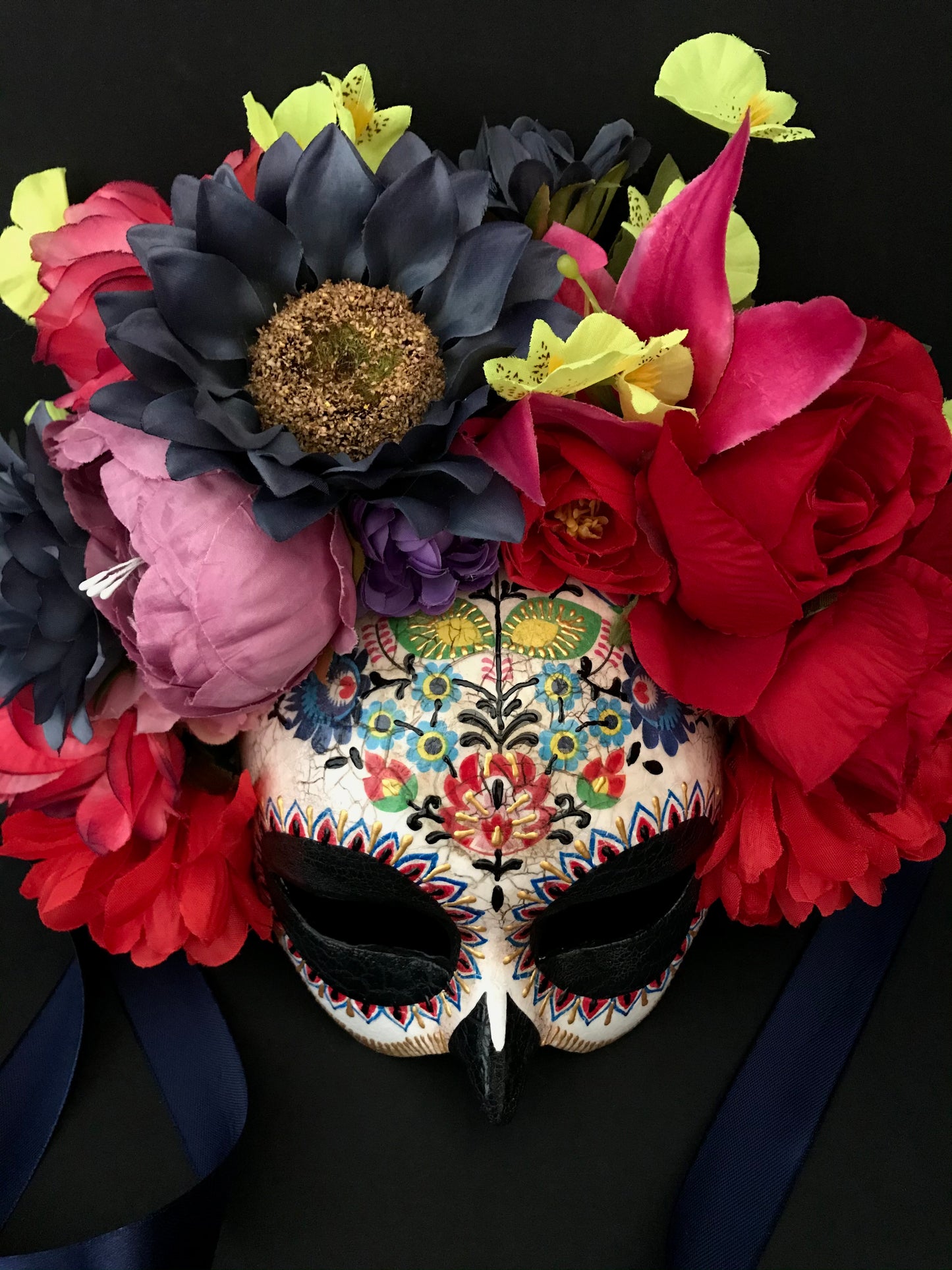 Half face Catrina mask with colored flowers