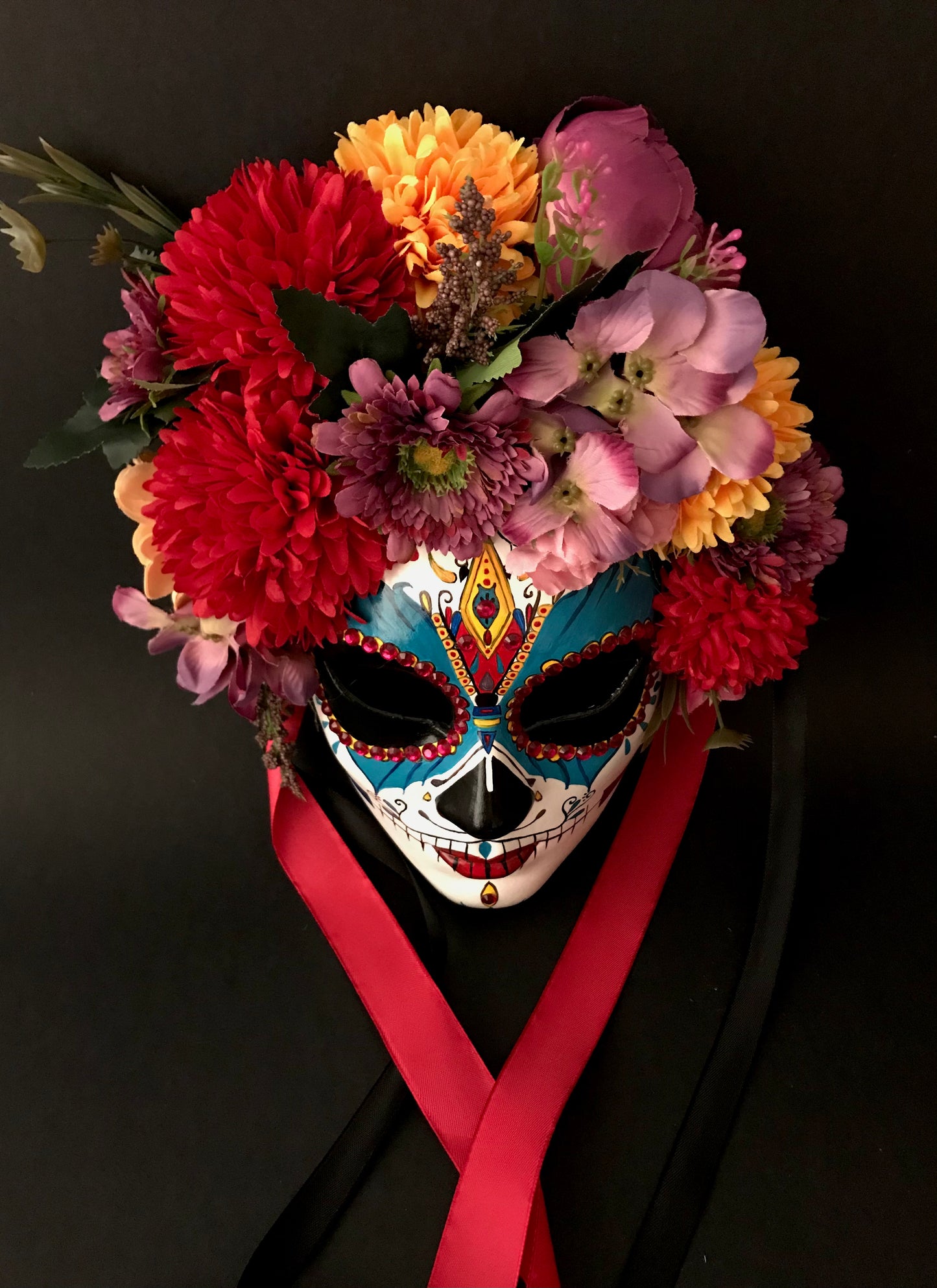 Catrina with colored flowers