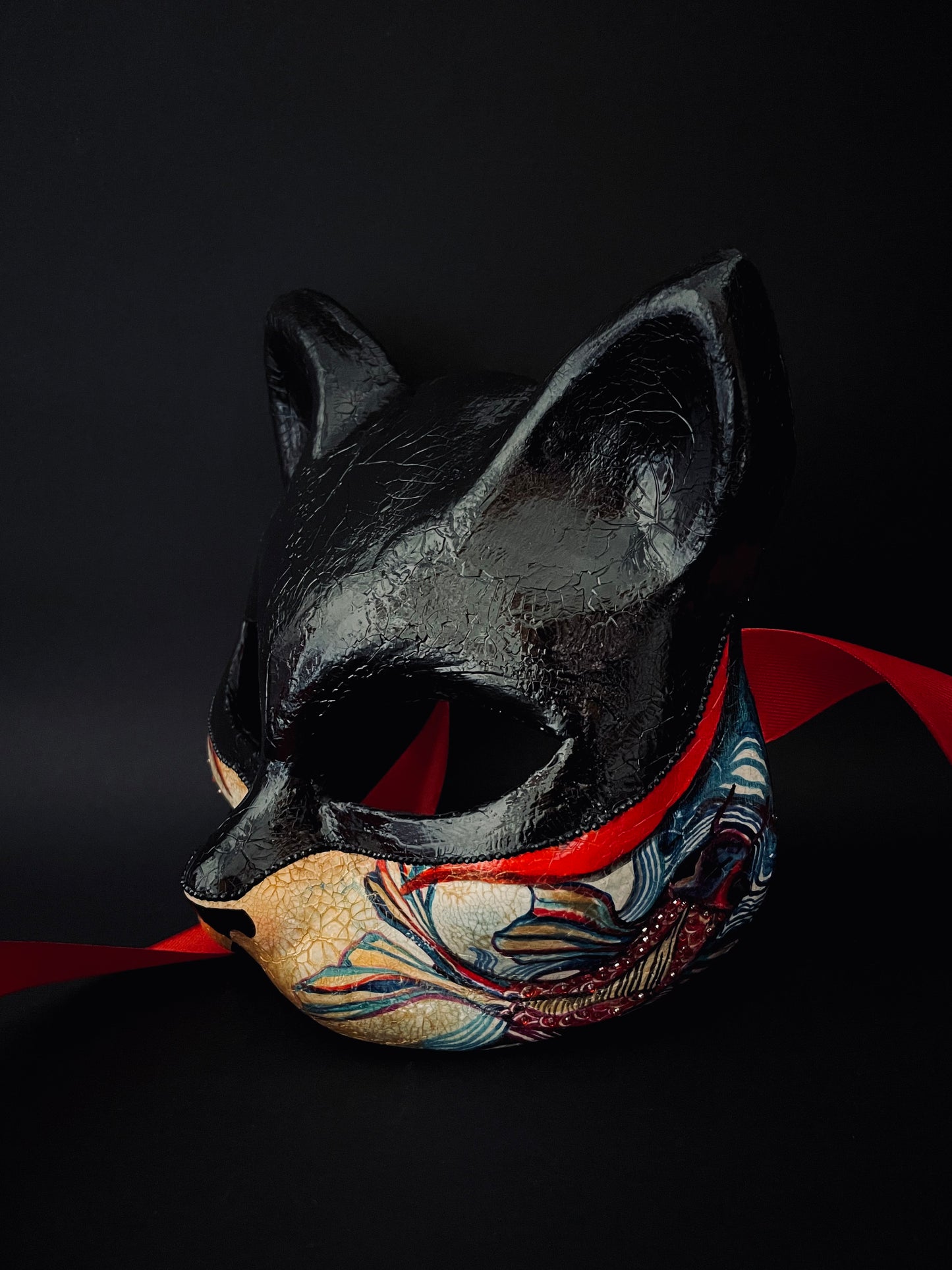 Black Kitsune mask. Japanese fox.