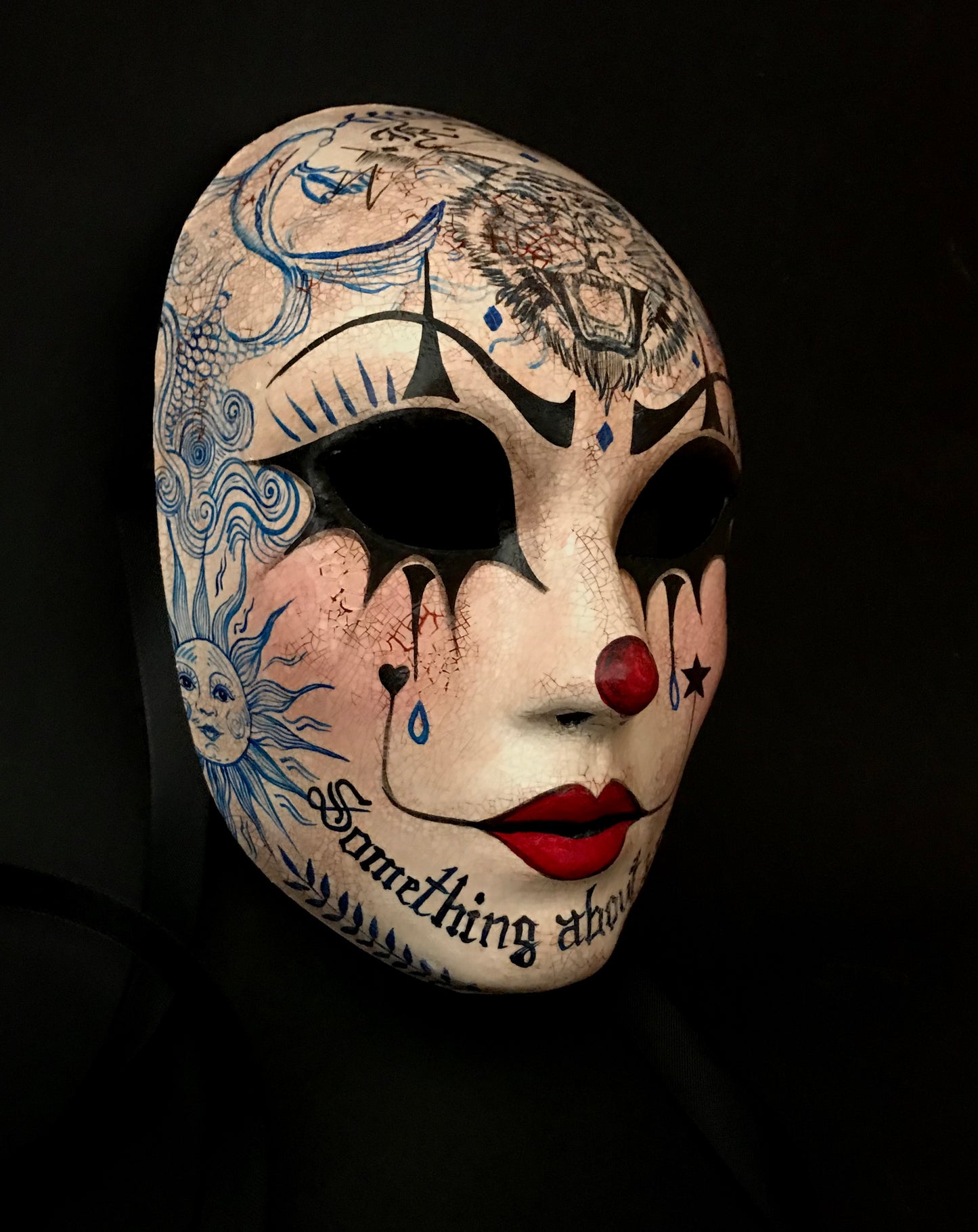 Pierrot mask with tattoos