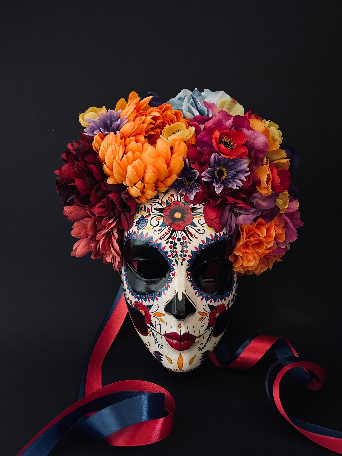 Catrina mask with colored flowers