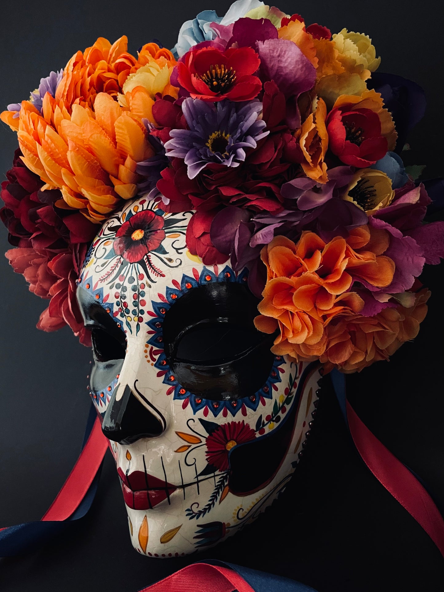 Catrina mask with colored flowers