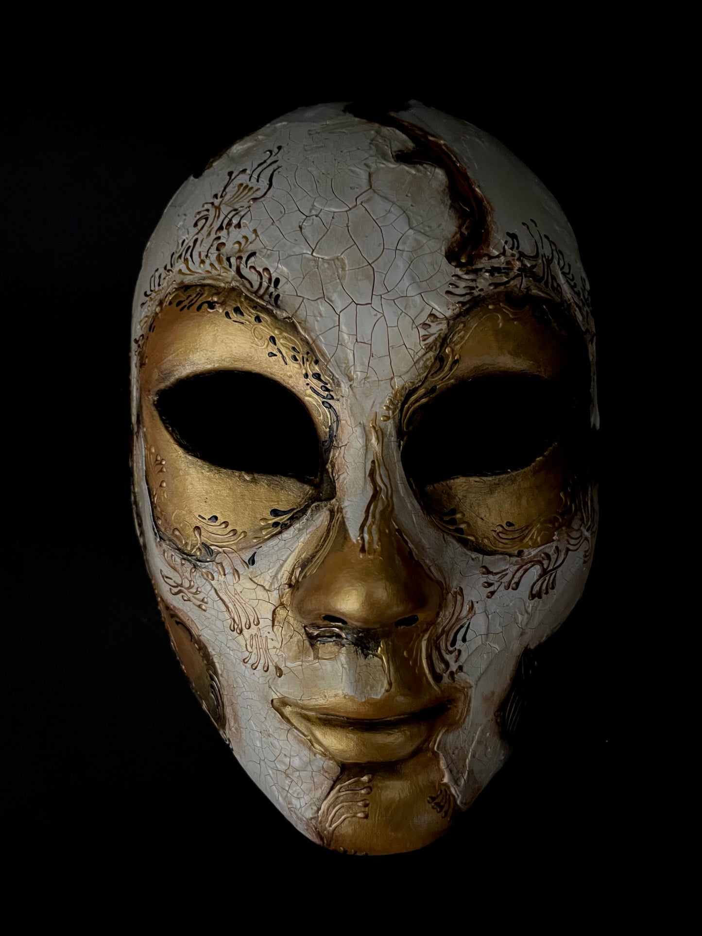 White and gold skull. Masquerade mask.