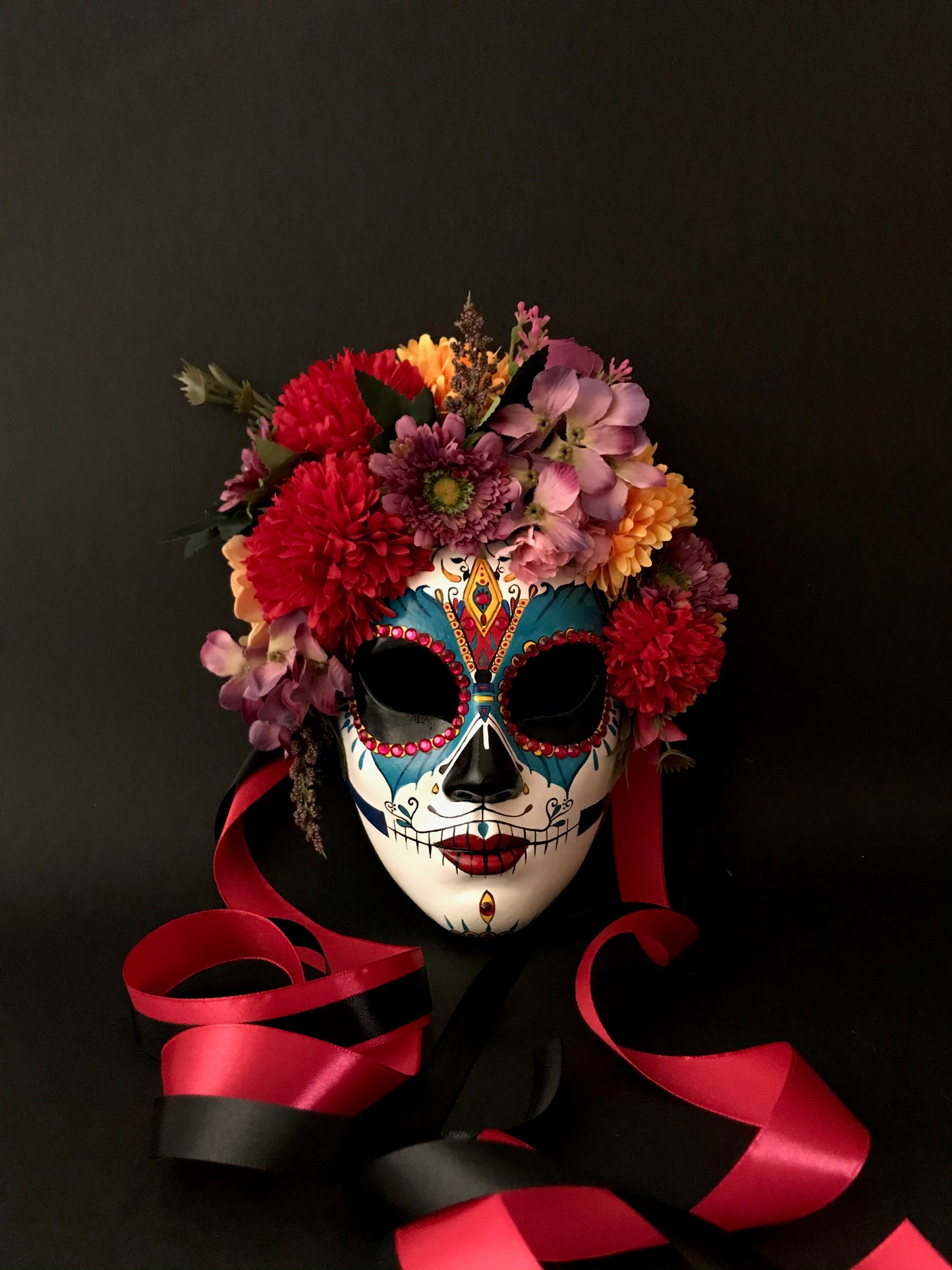 Catrina with colored flowers