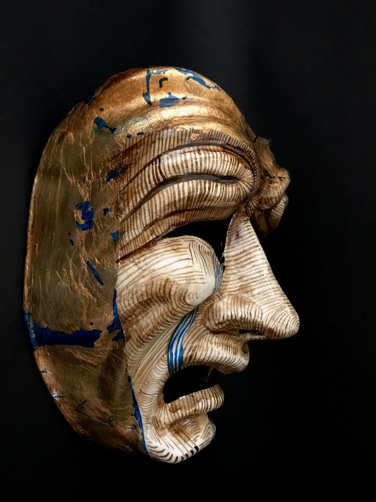 Tragedy mask with gold