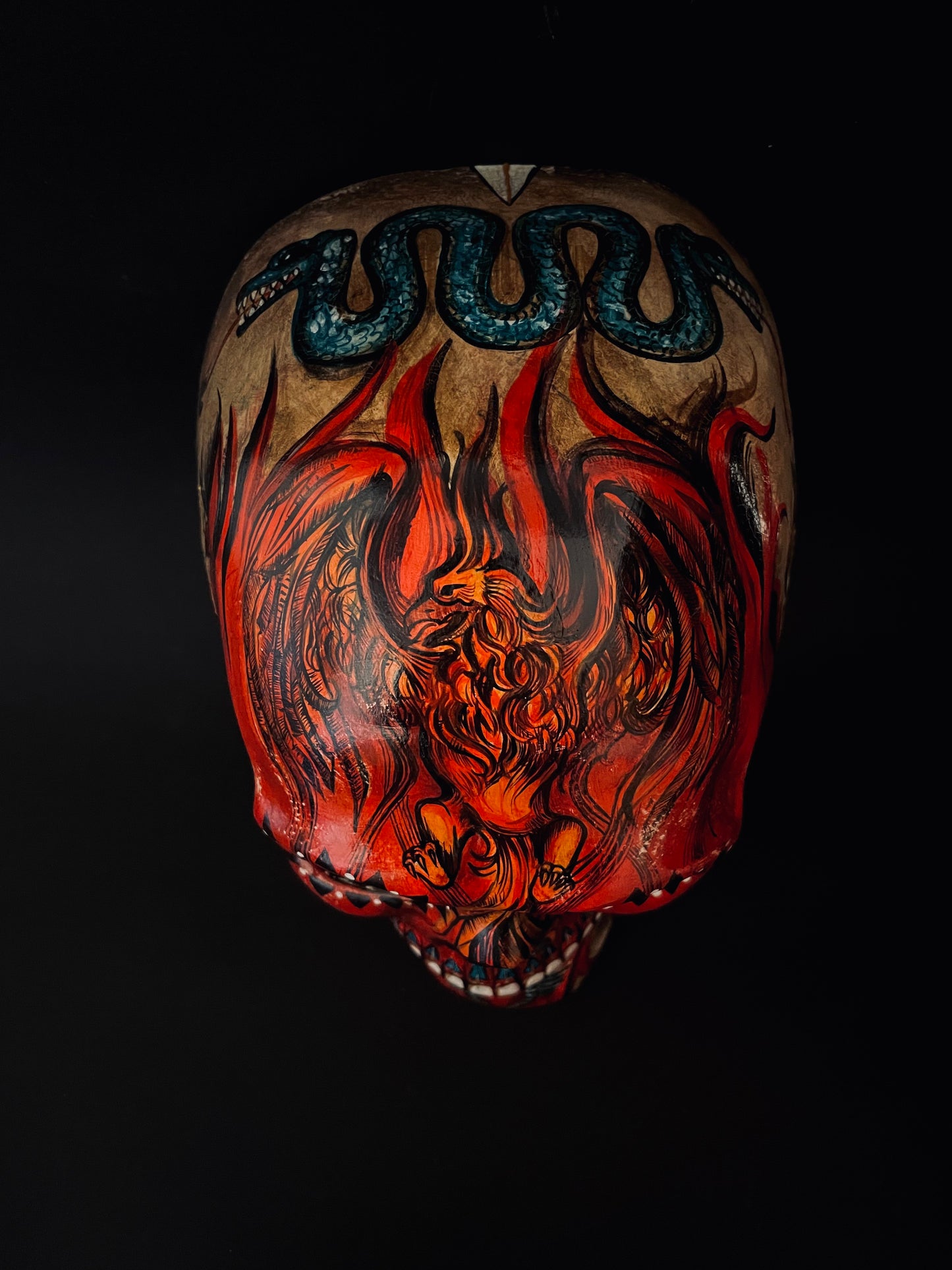 Red skull with phoenix bird. Skull mask.