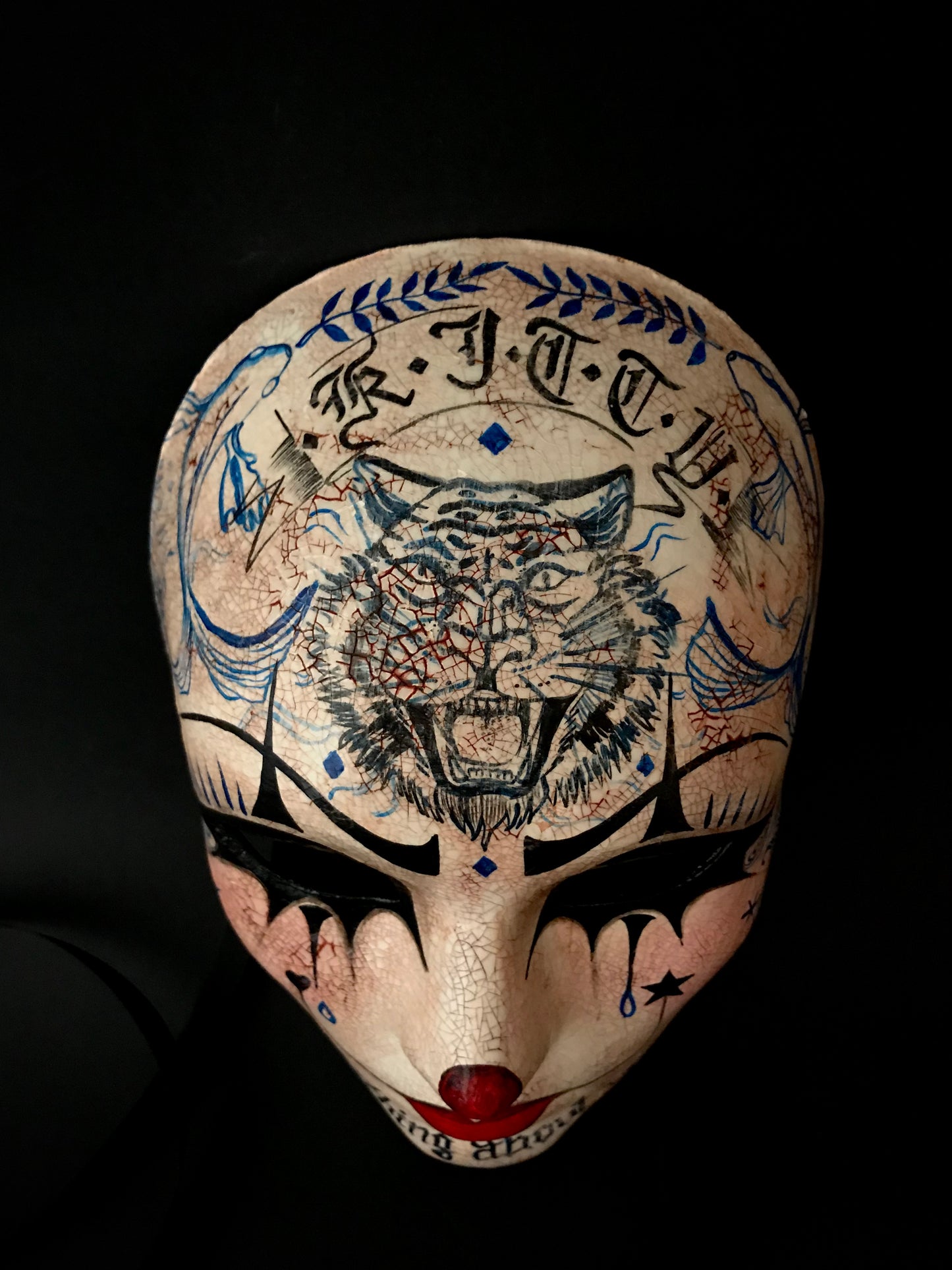 Pierrot mask with tattoos