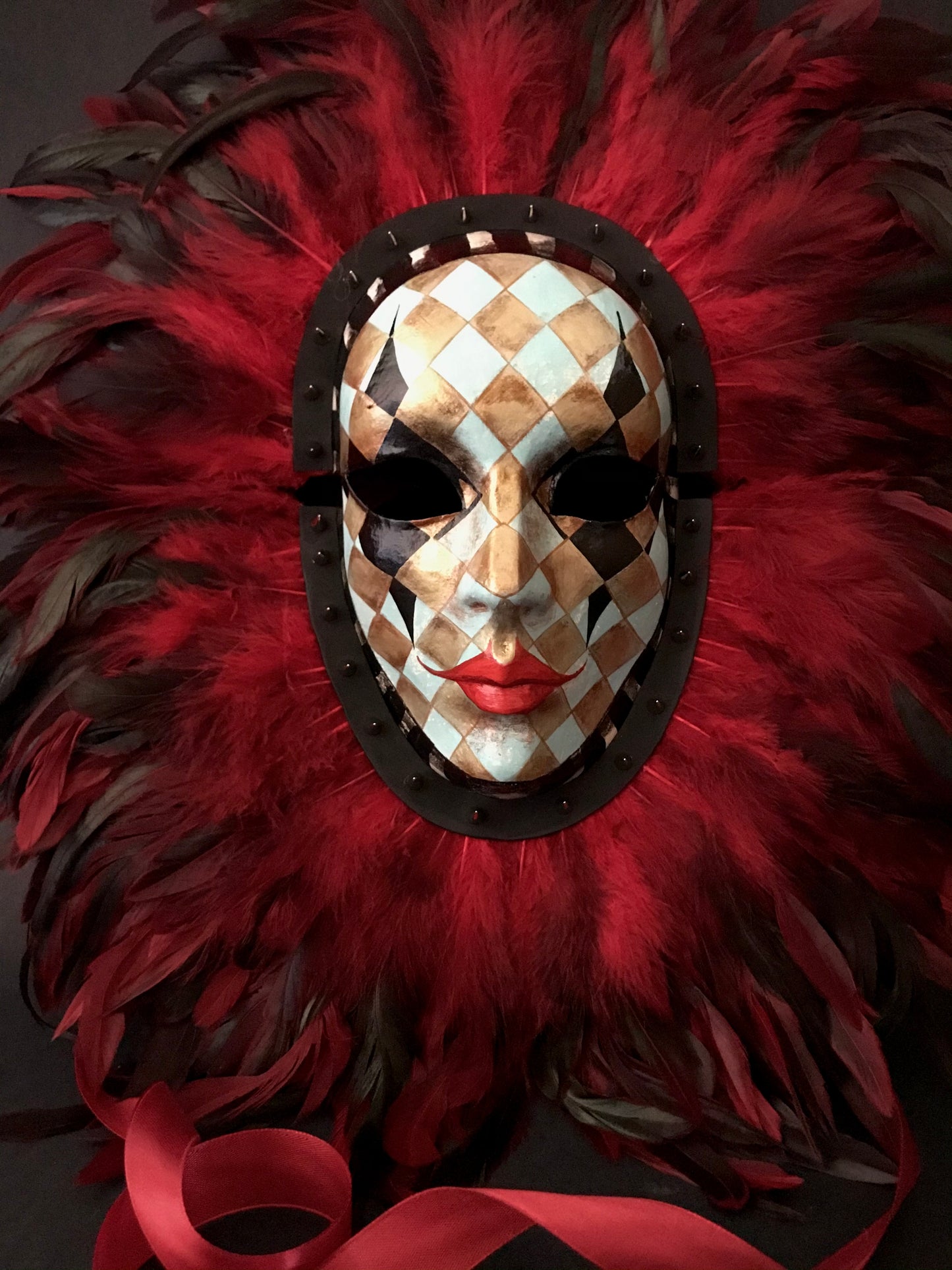 Double mask with feathers