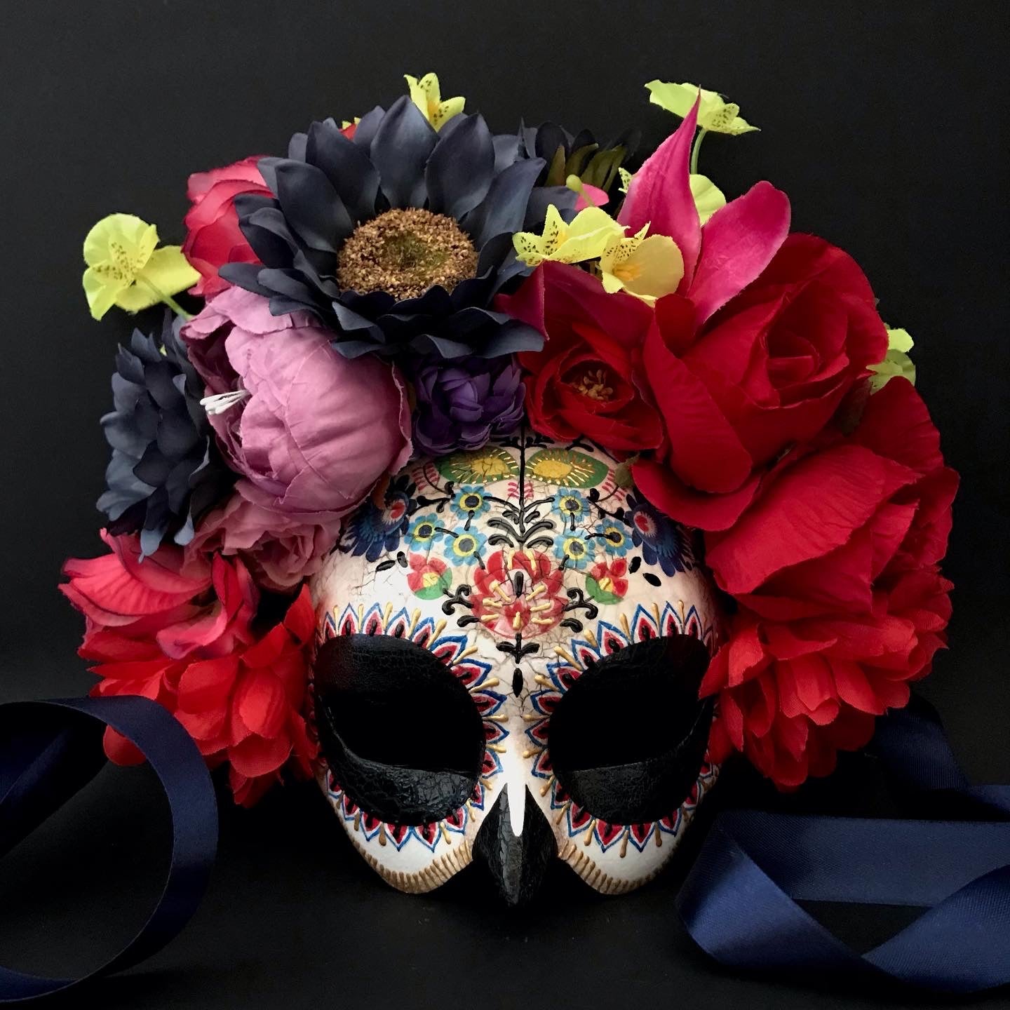 Half face Catrina mask with colored flowers