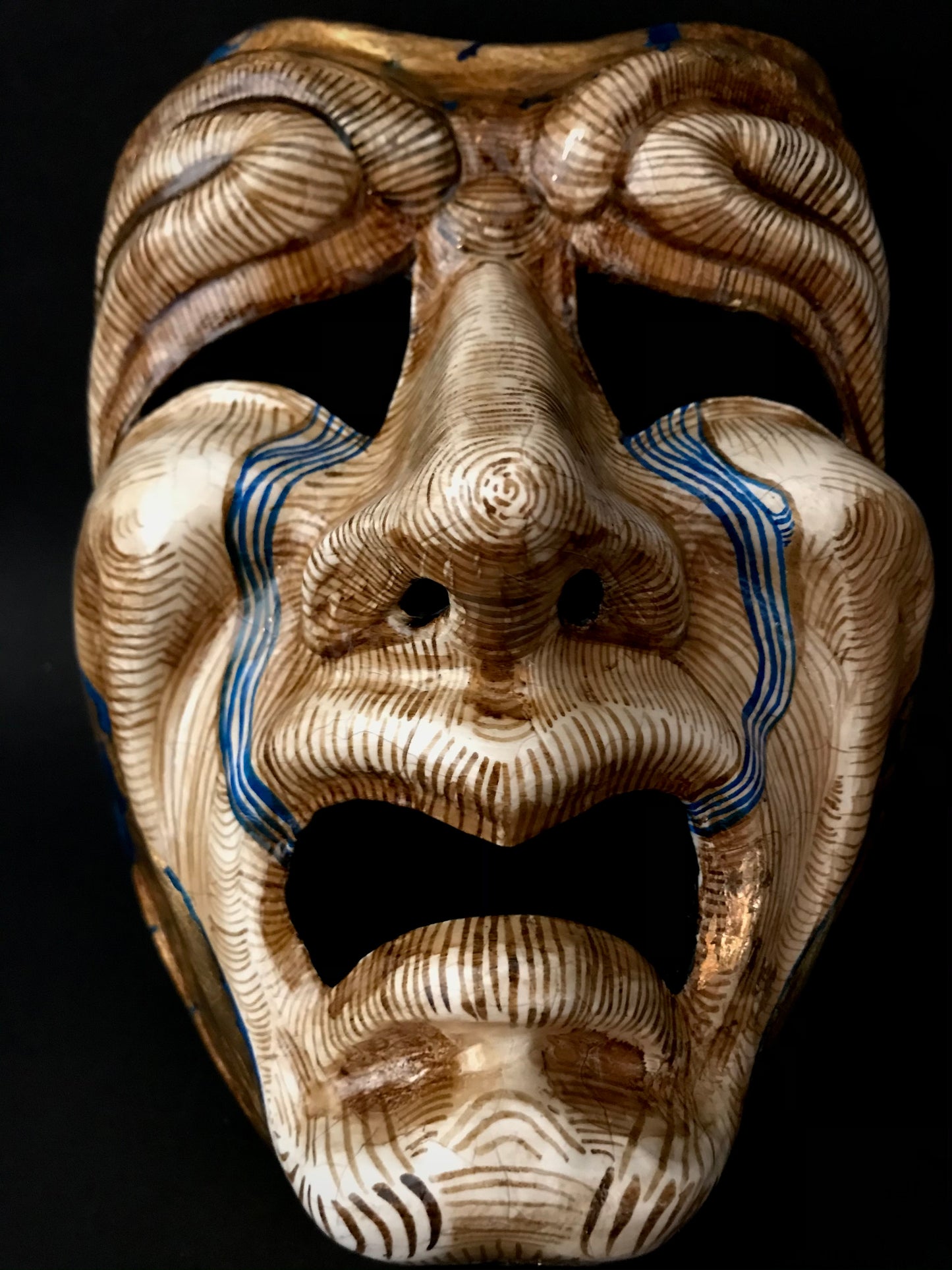 Tragedy mask with gold