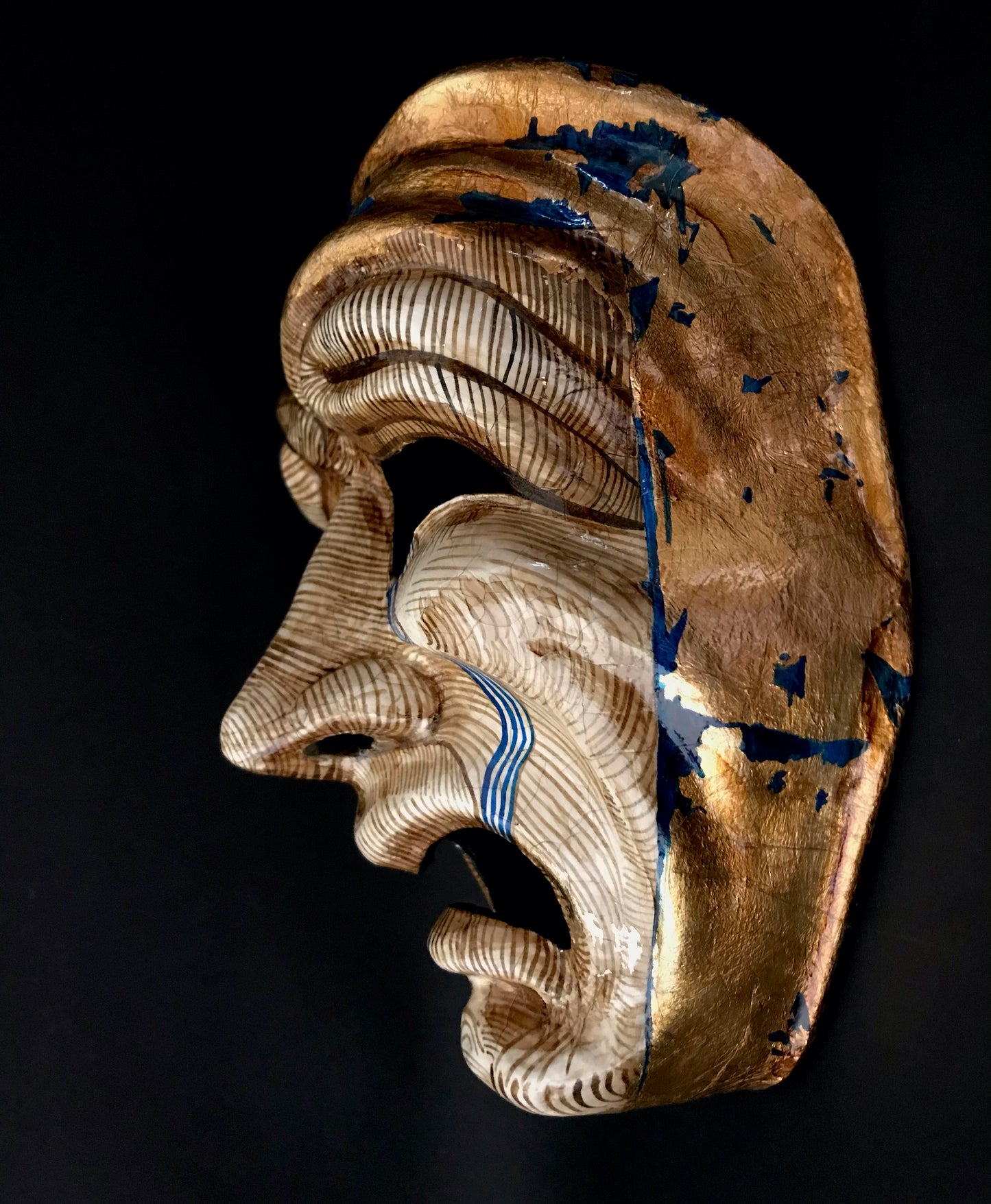 Tragedy mask with gold