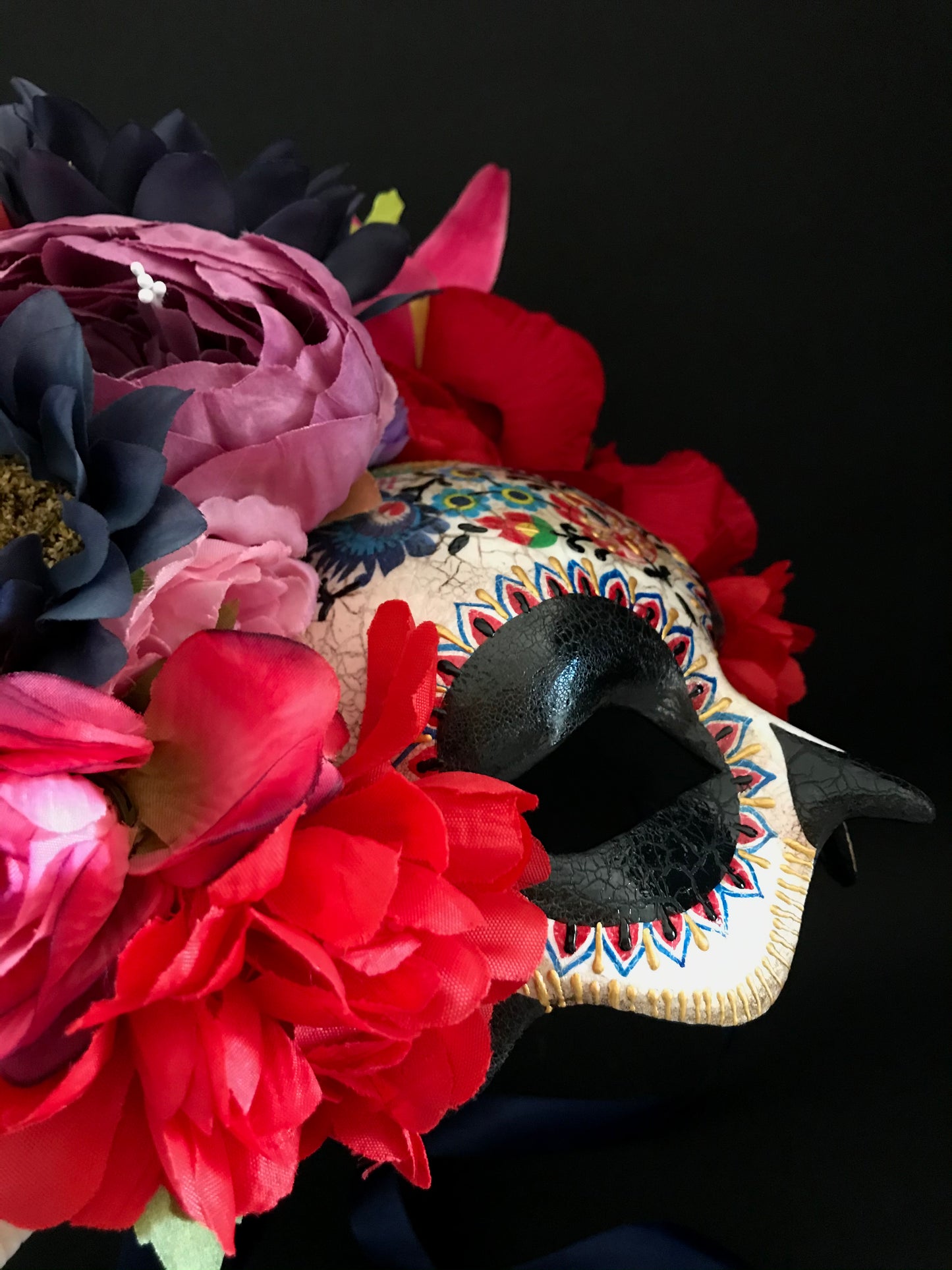 Half face Catrina mask with colored flowers