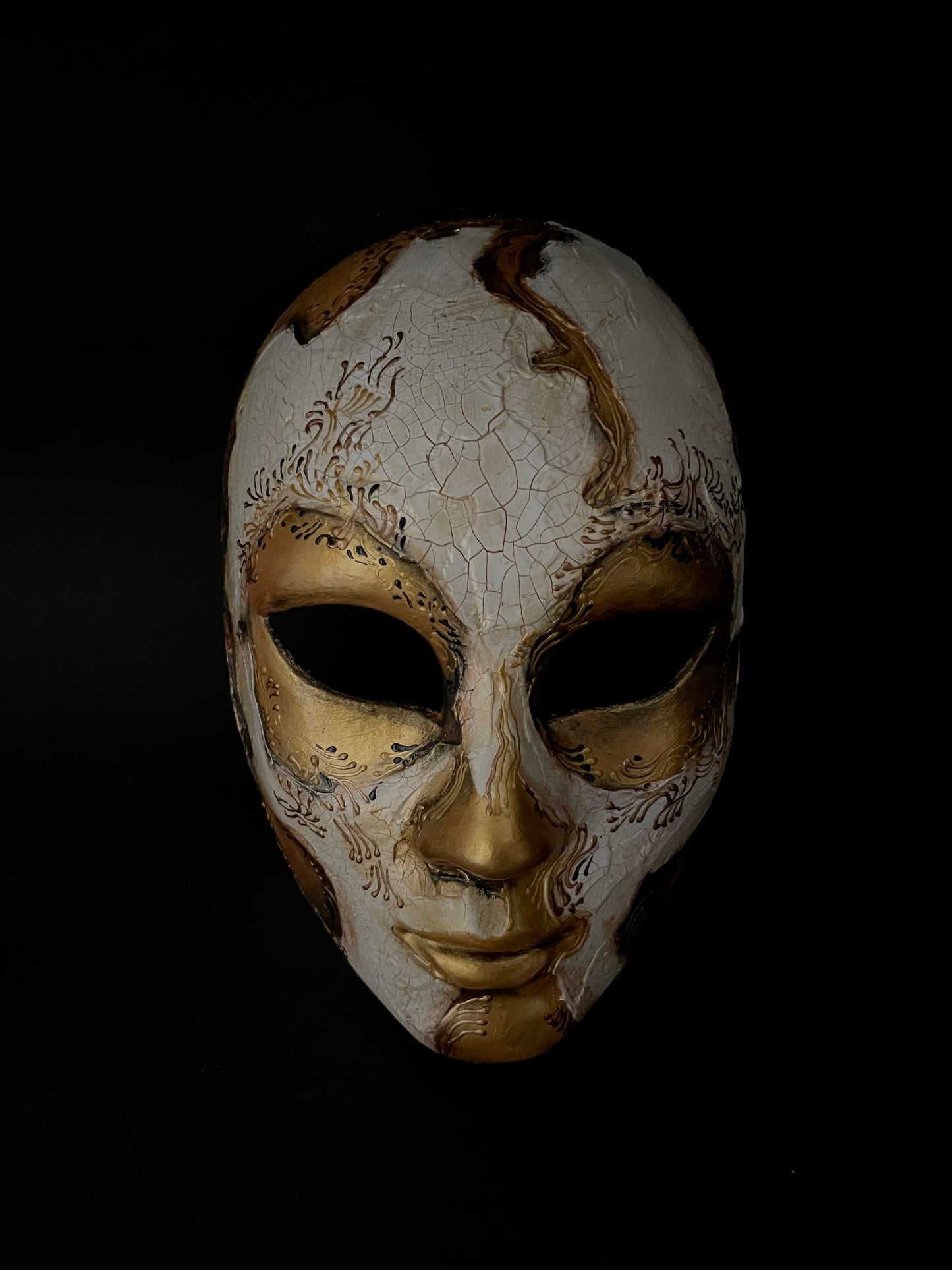 White and gold skull. Masquerade mask.