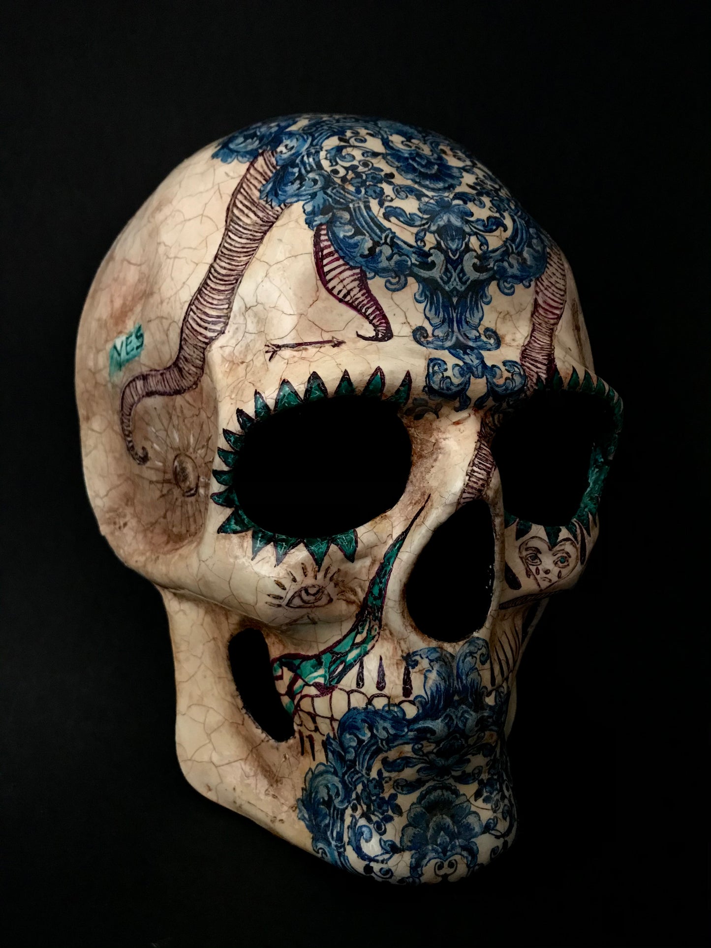 Skull mask with doodles