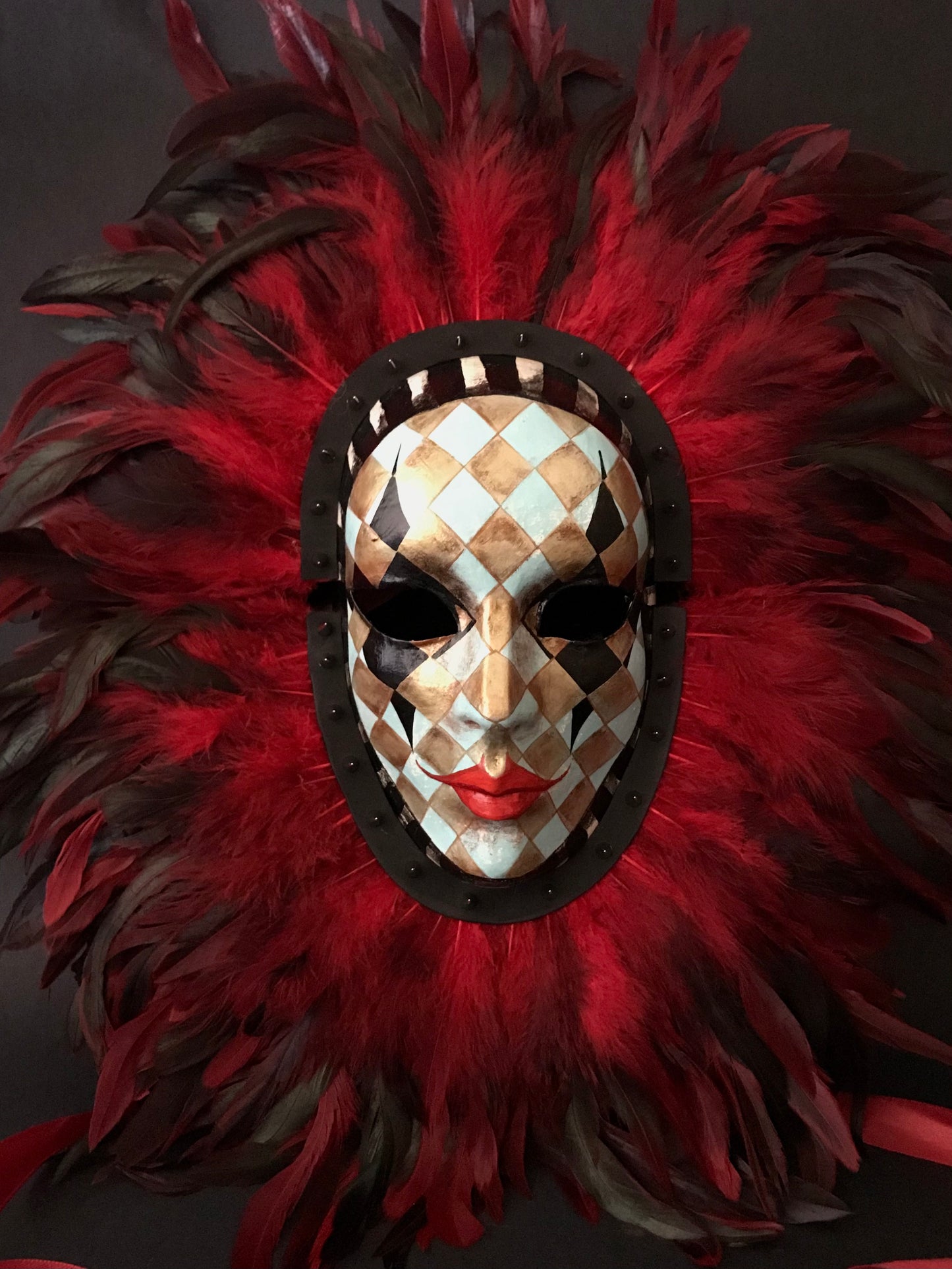 Double mask with feathers