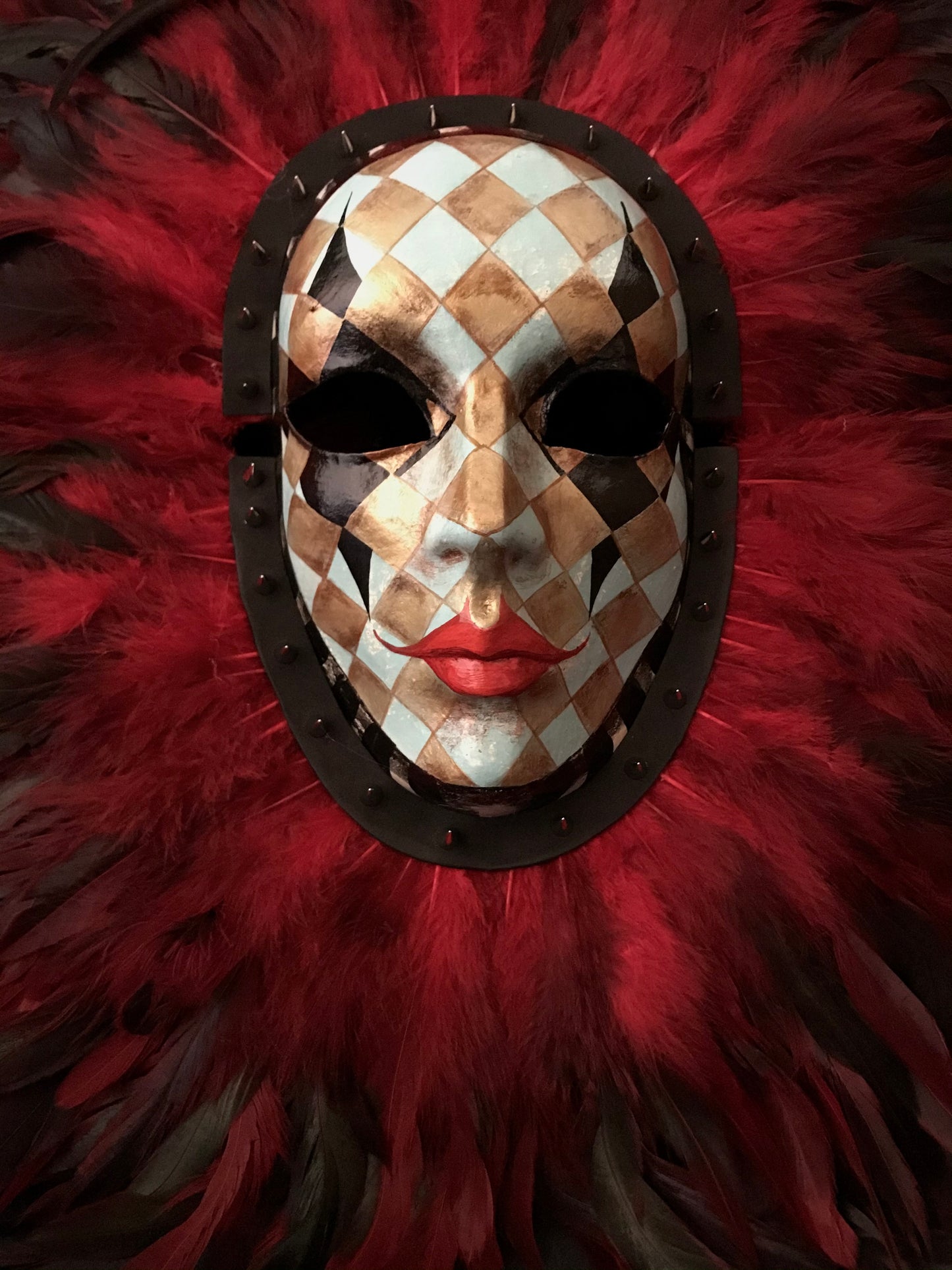 Double mask with feathers