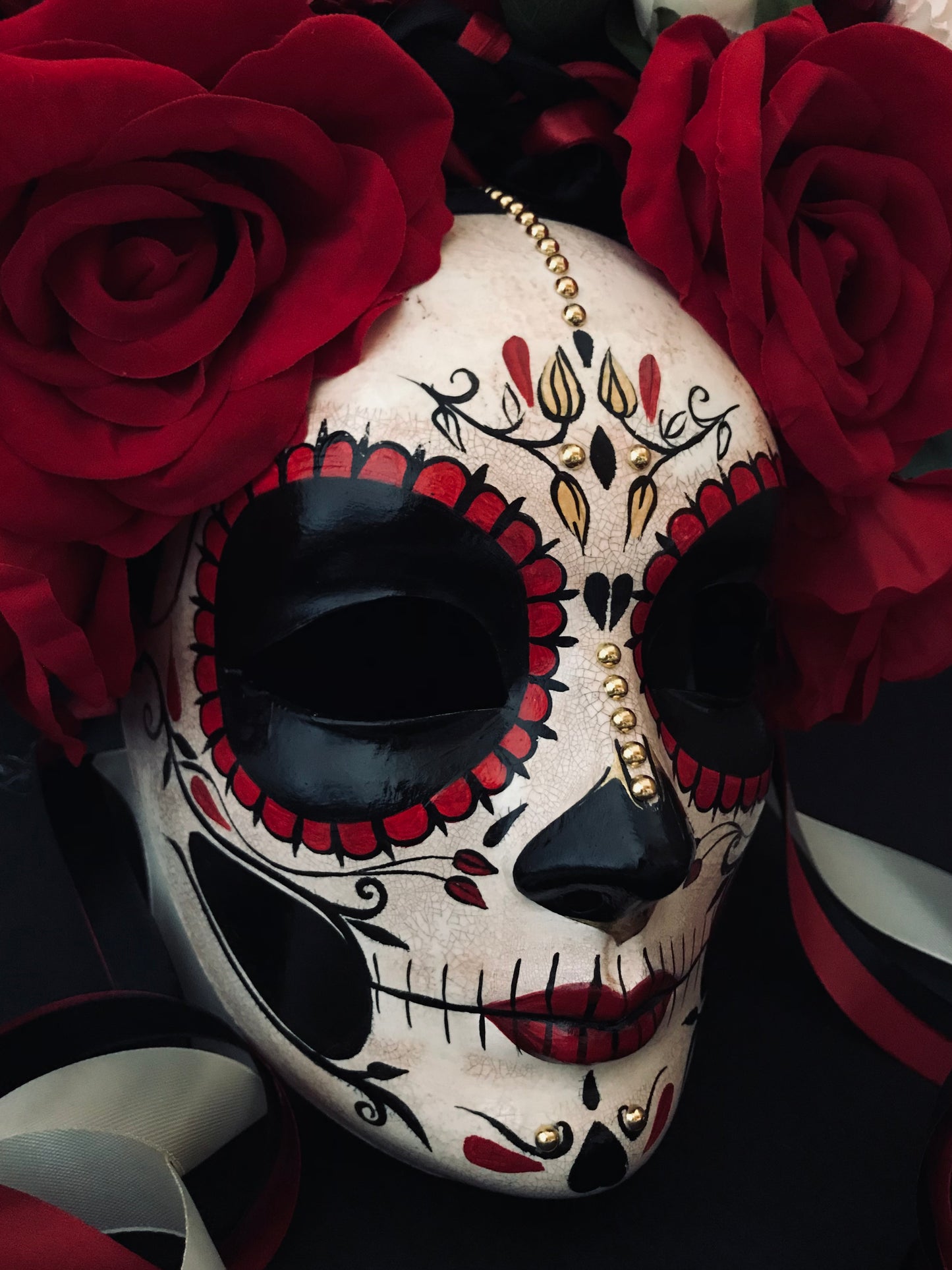 Catrina with red roses