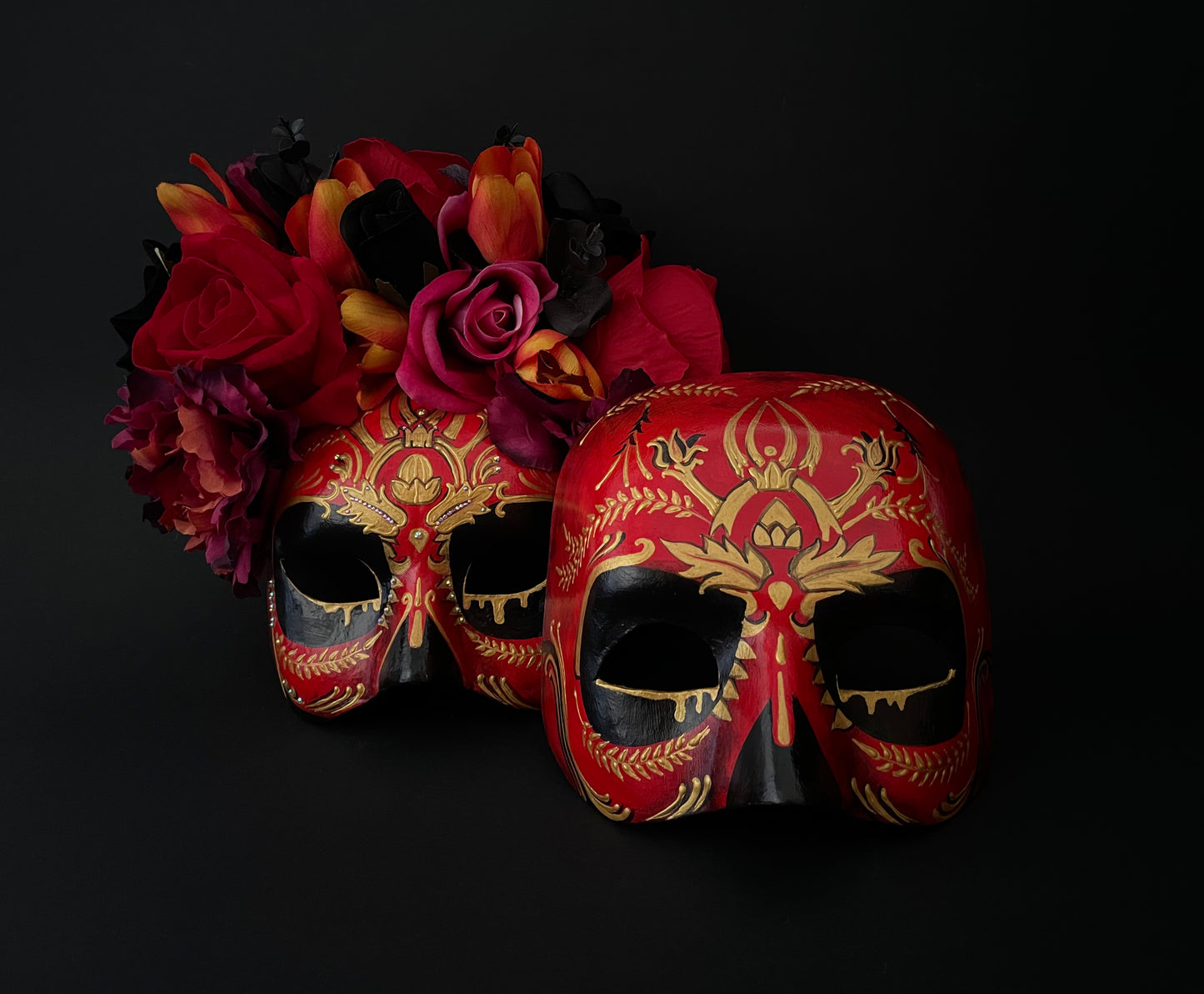 Red couple’s masks. Day of the dead couple