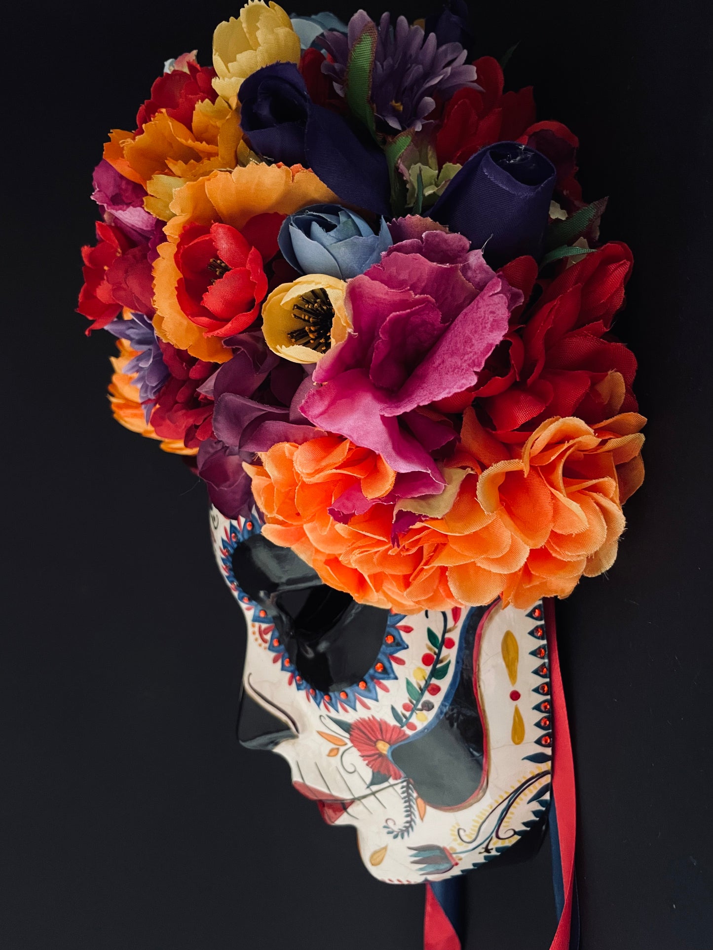 Catrina mask with colored flowers