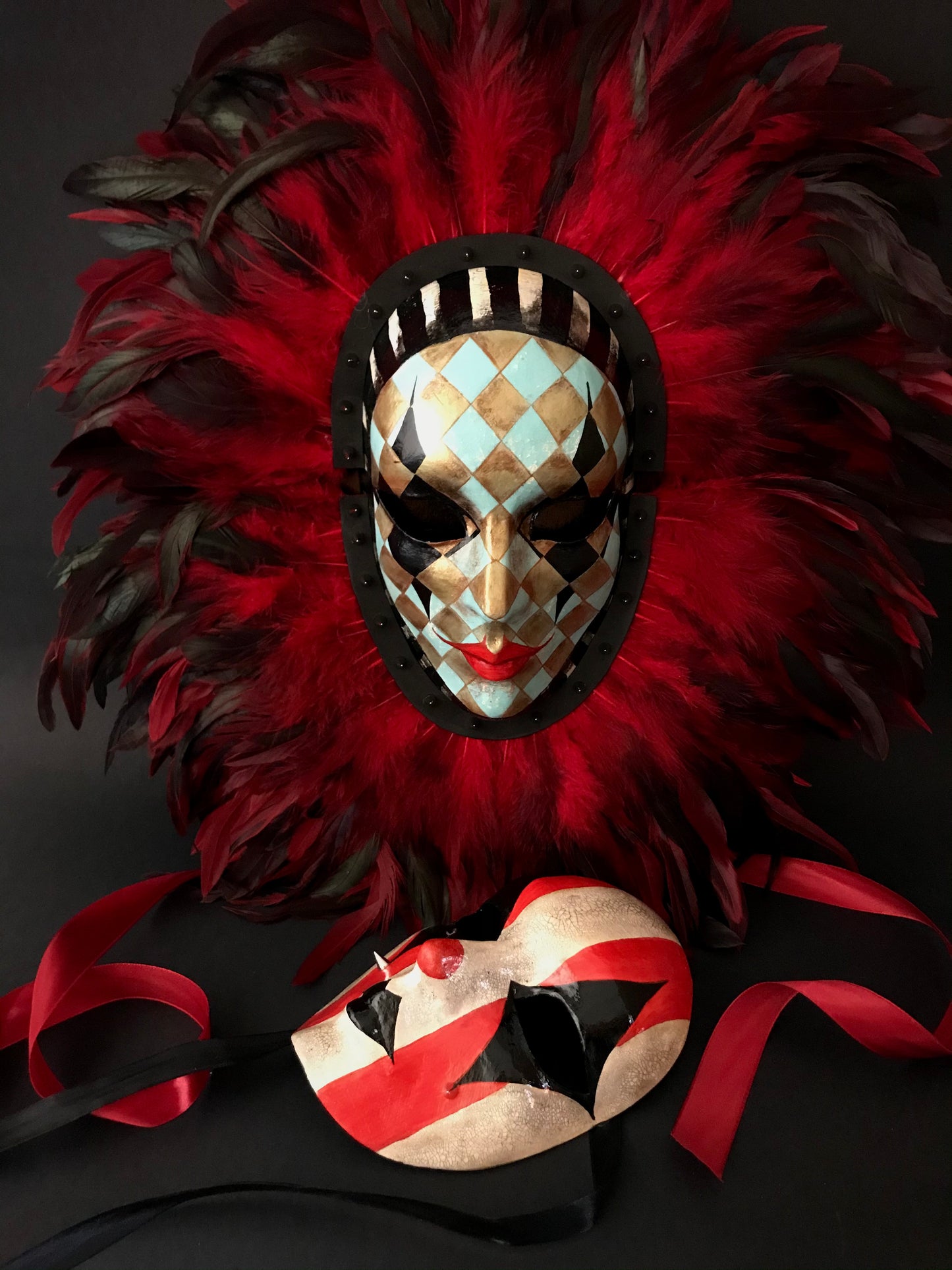 Double mask with feathers