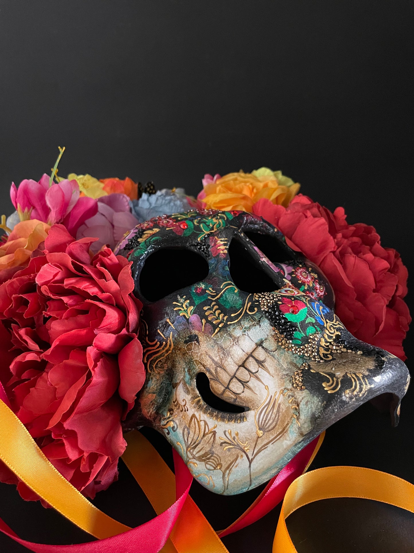 Santa Muerte mask. Skull mask with flowers