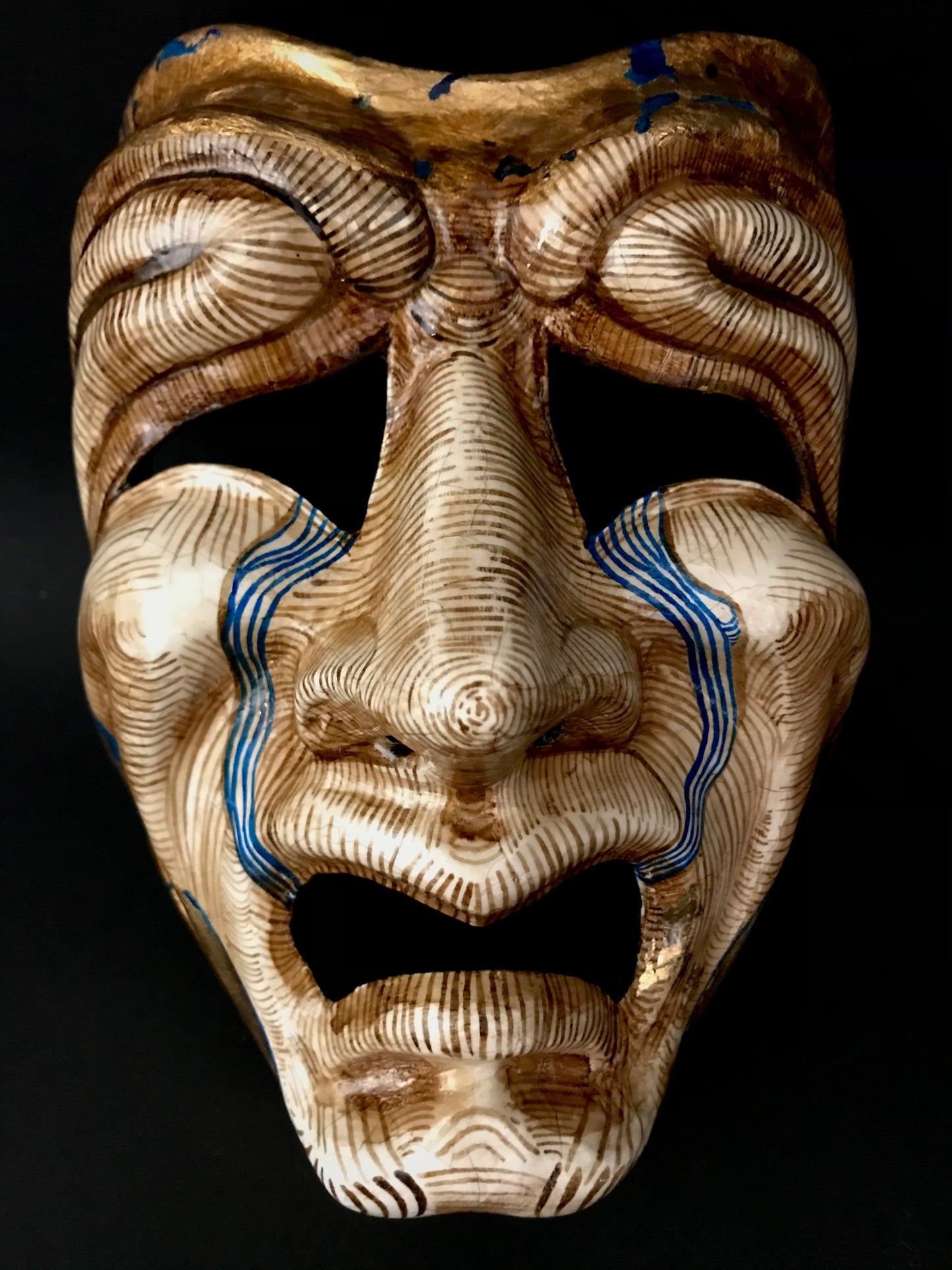 Tragedy mask with gold