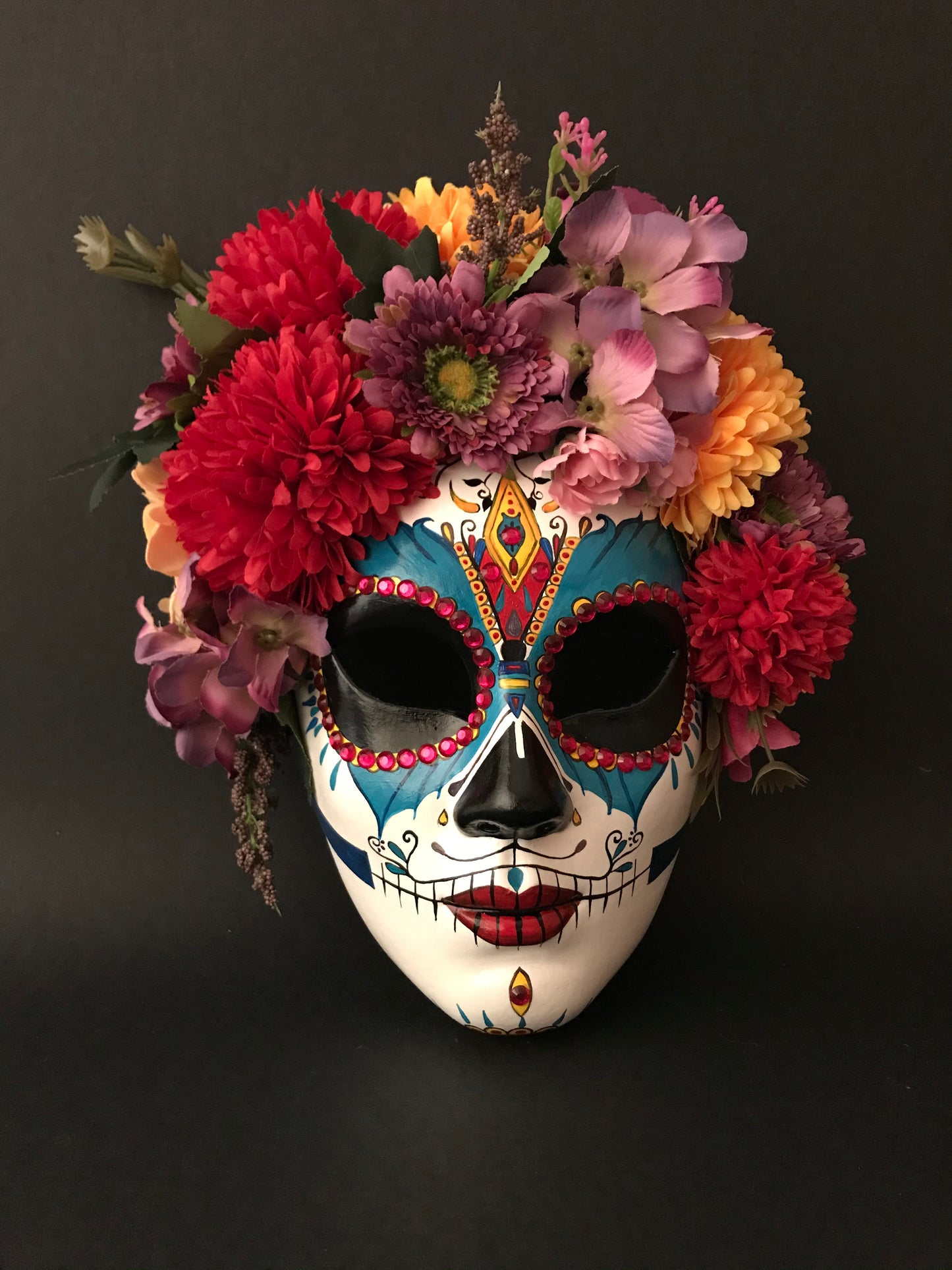 Catrina with colored flowers