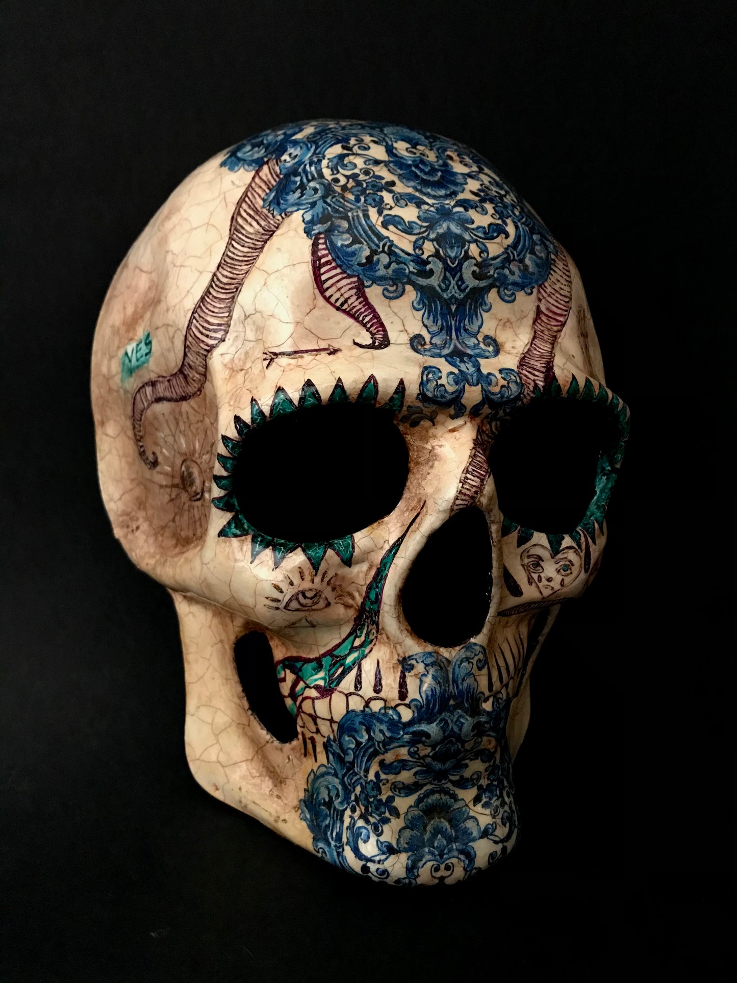 Skull mask with doodles