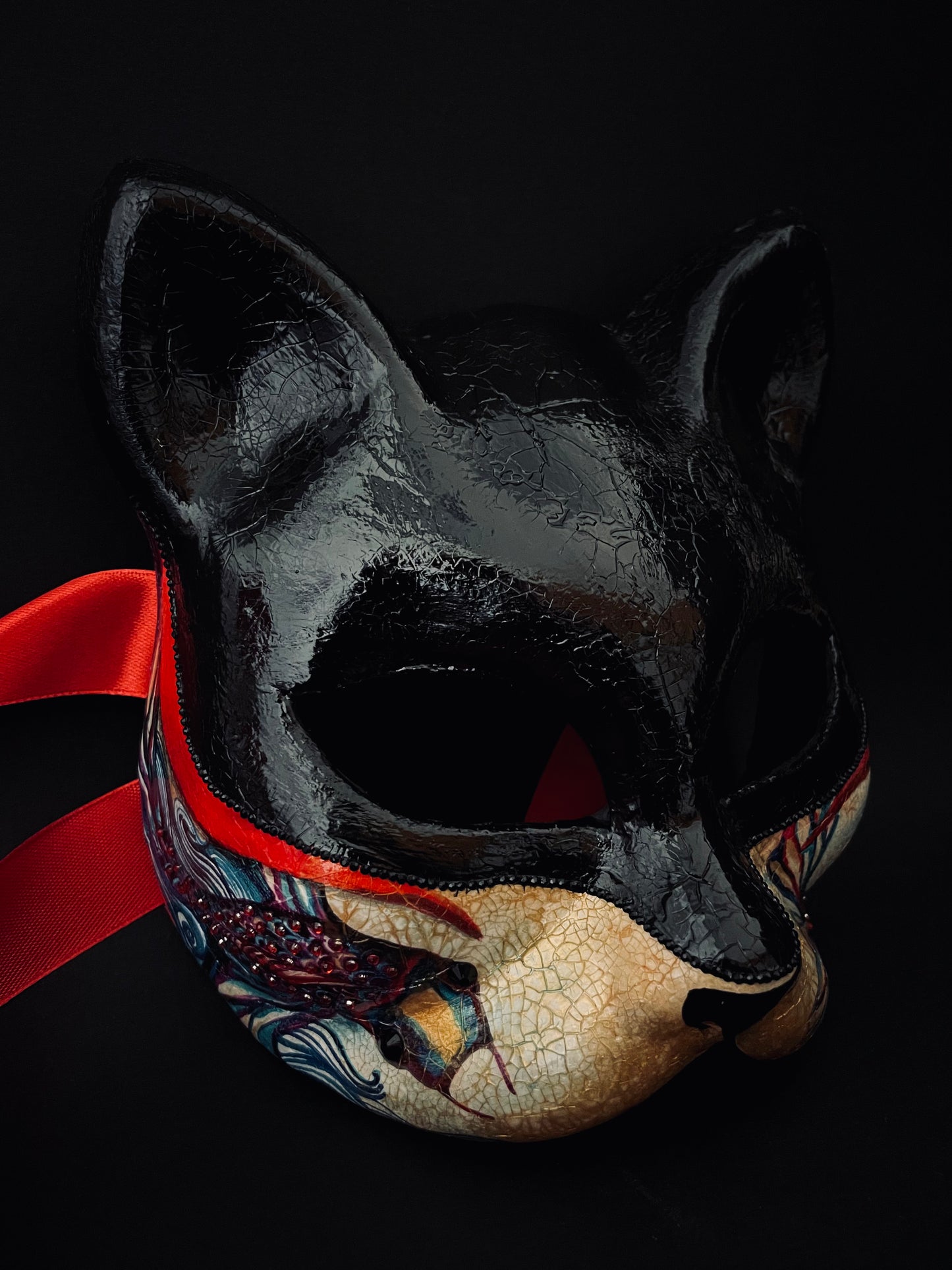 Black Kitsune mask. Japanese fox.