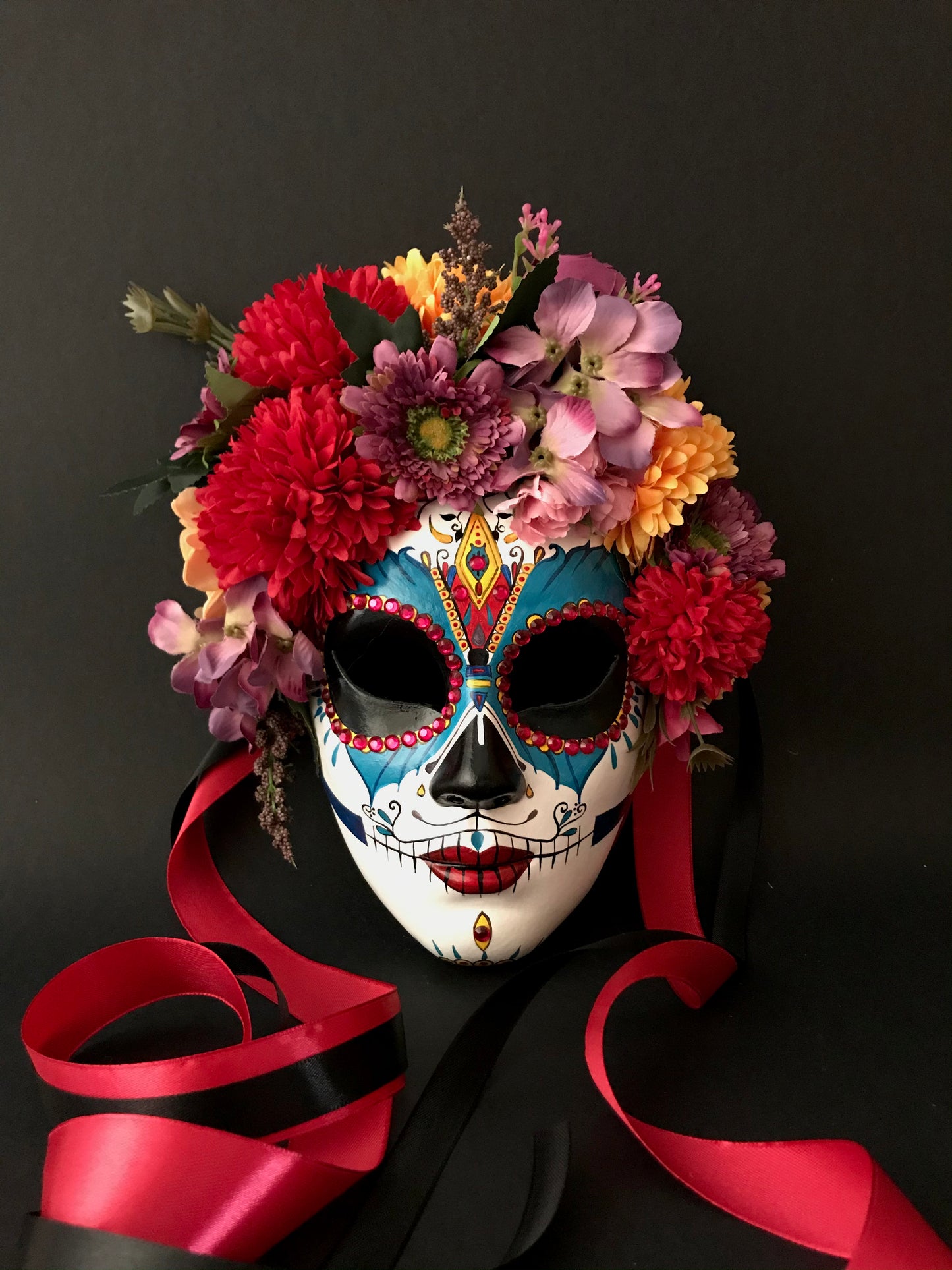 Catrina with colored flowers