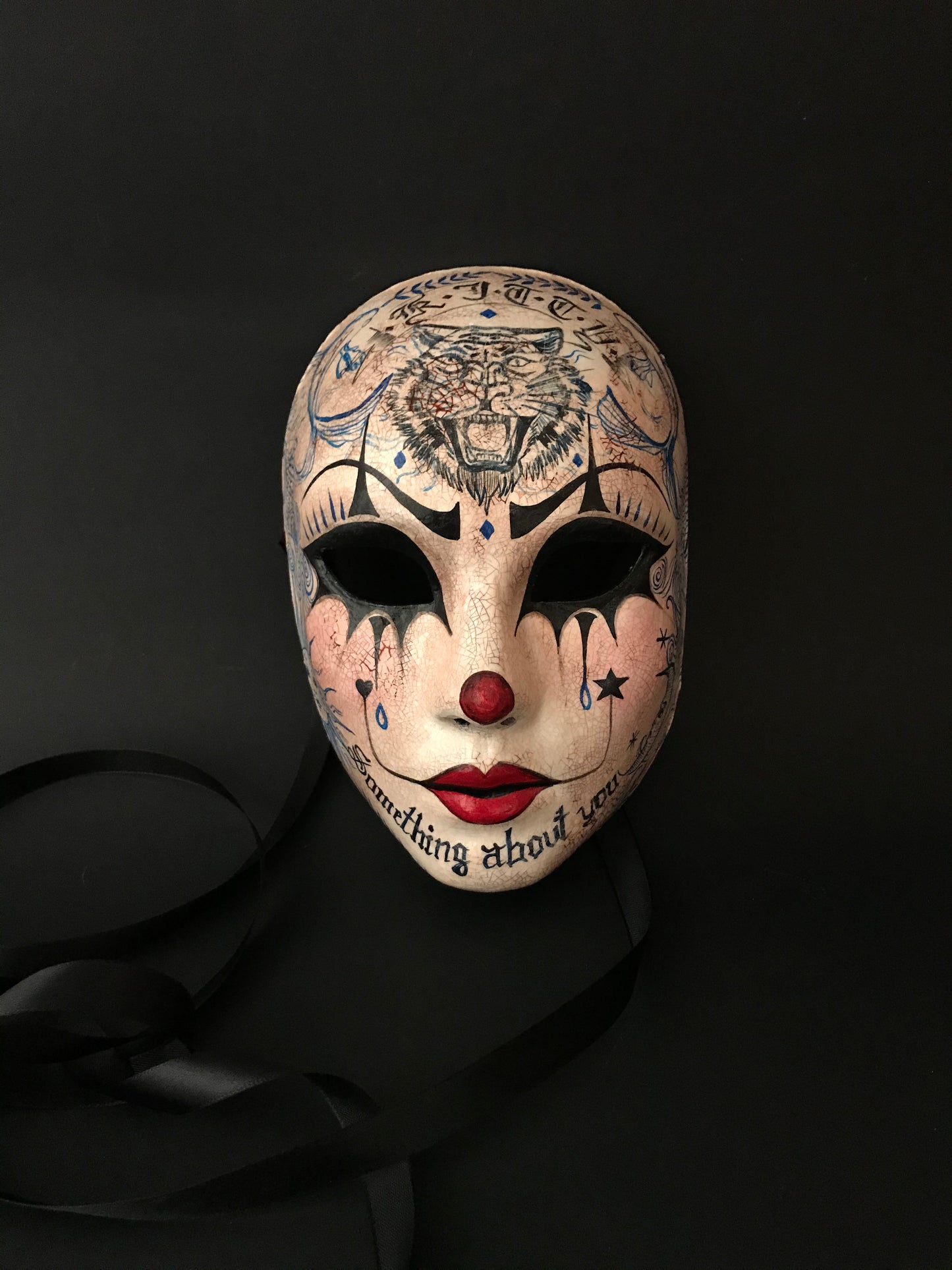 Pierrot mask with tattoos